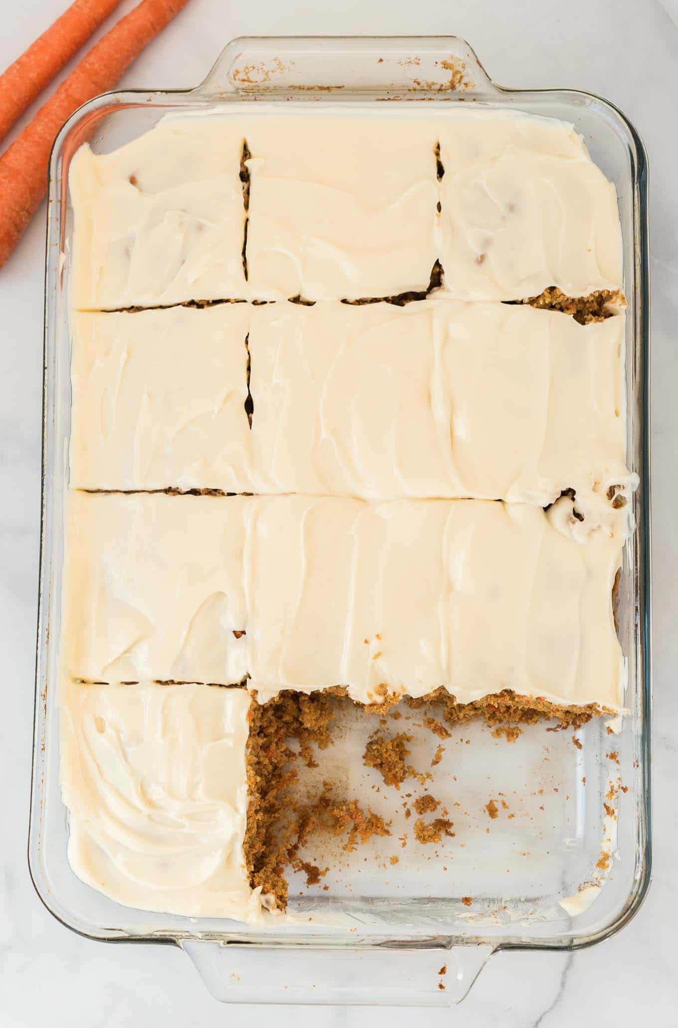 carrot cake sliced with two pieces missing