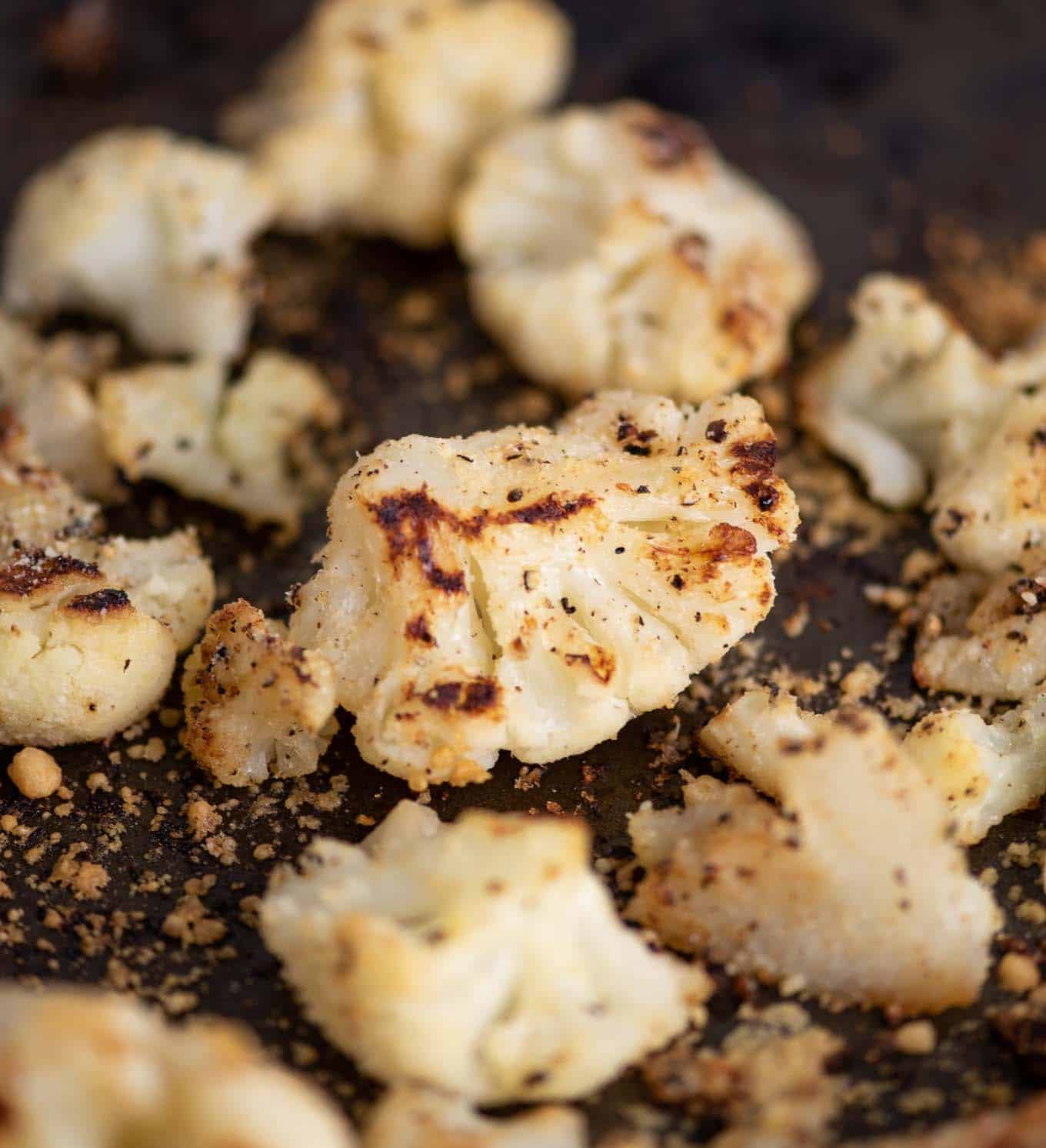 roasted cauliflower on a baking sheet up close