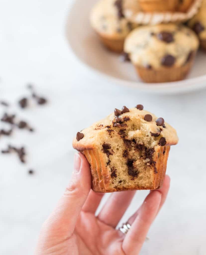 greek yogurt chocolate chip muffin with bite taken out