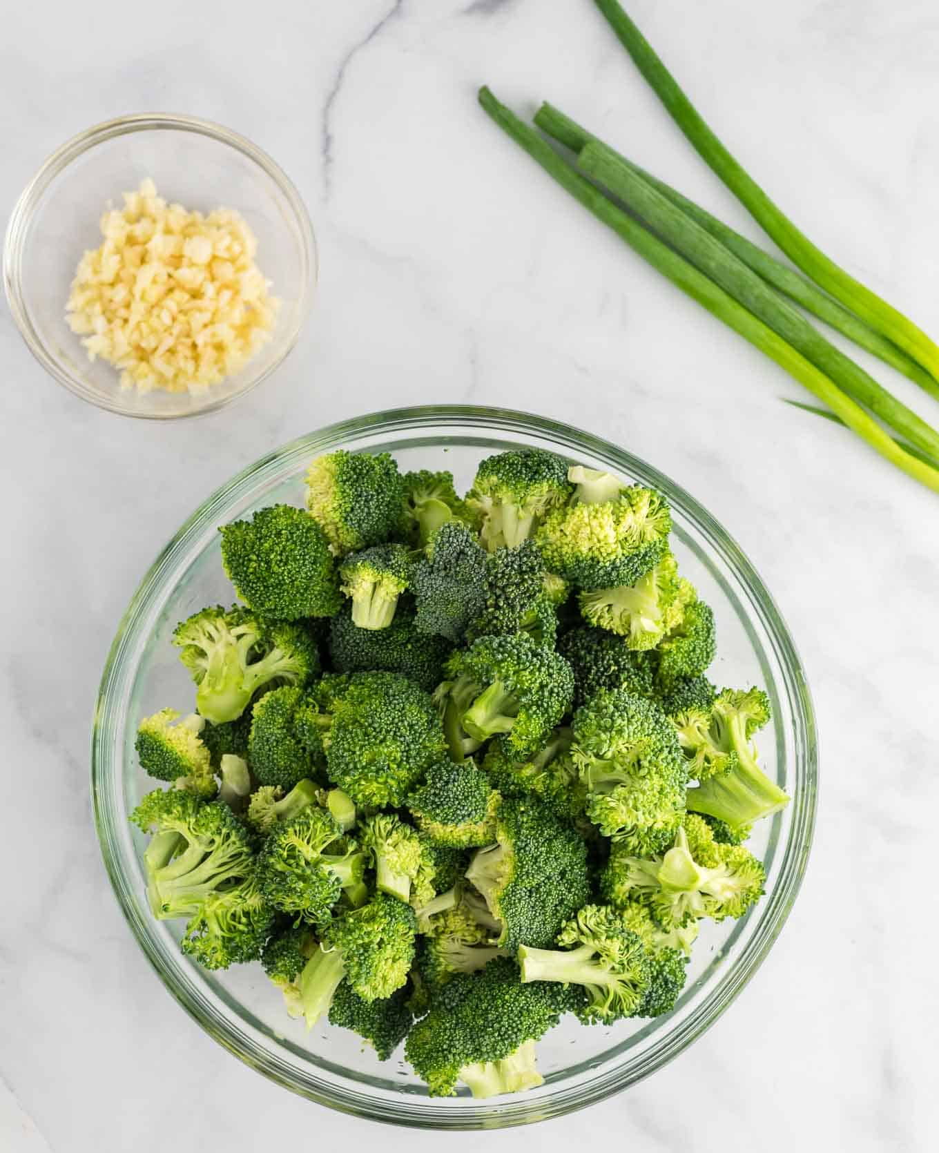 fresh broccoli florets in a bowl 