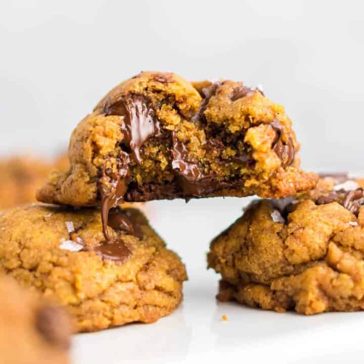 vegan pumpkin chocolate chip cookie with a bite taken out