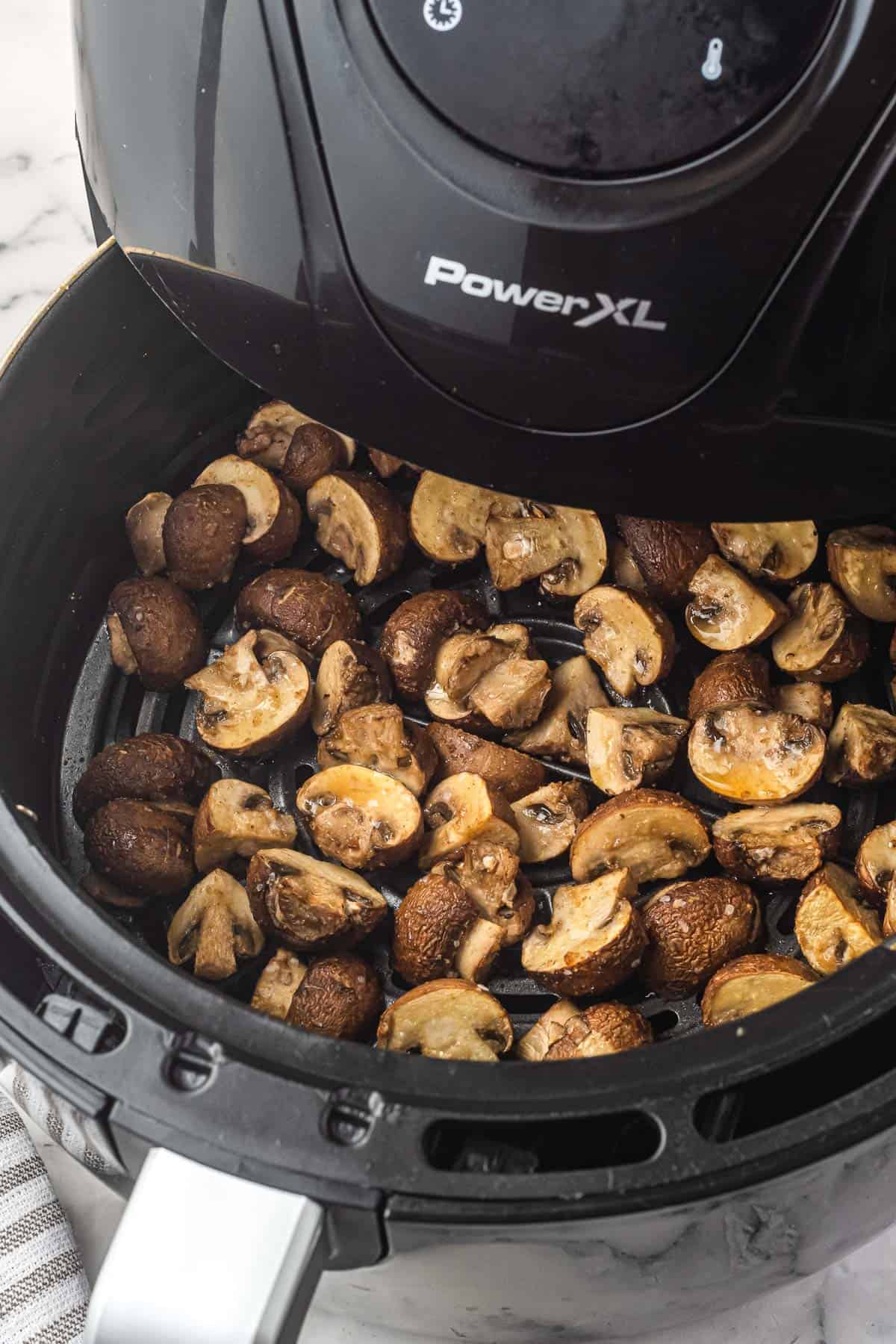 mushrooms placed in the air fryer basket