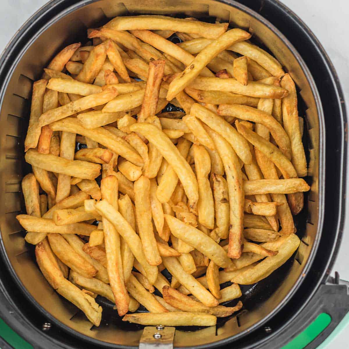 fries inside of an air fryer basket