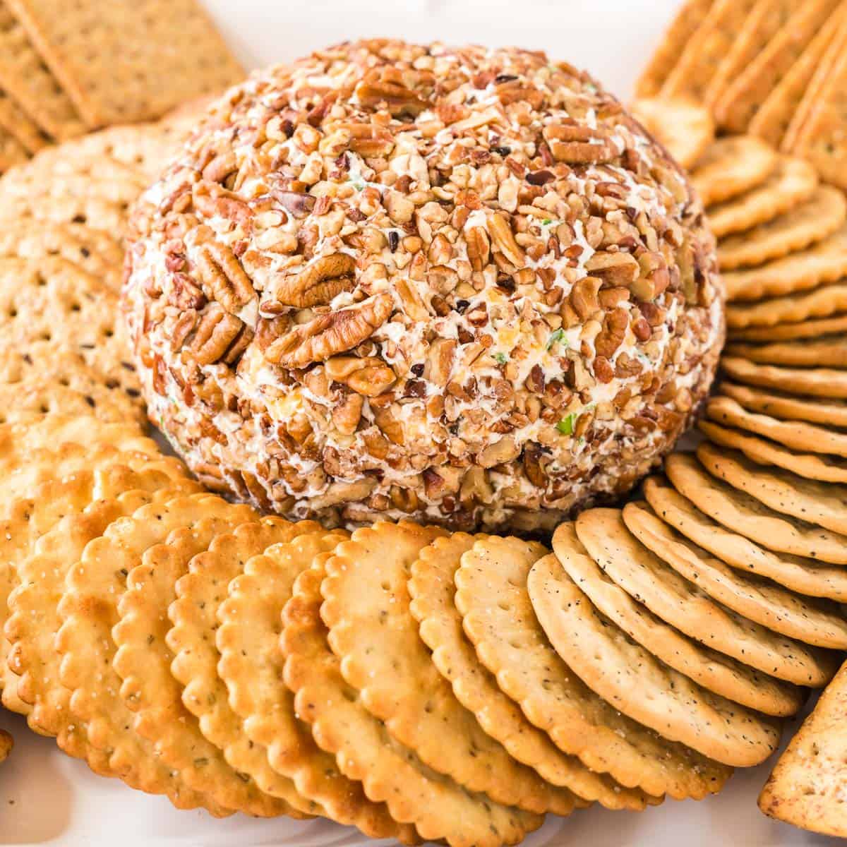 cheese ball surrounded by crackers
