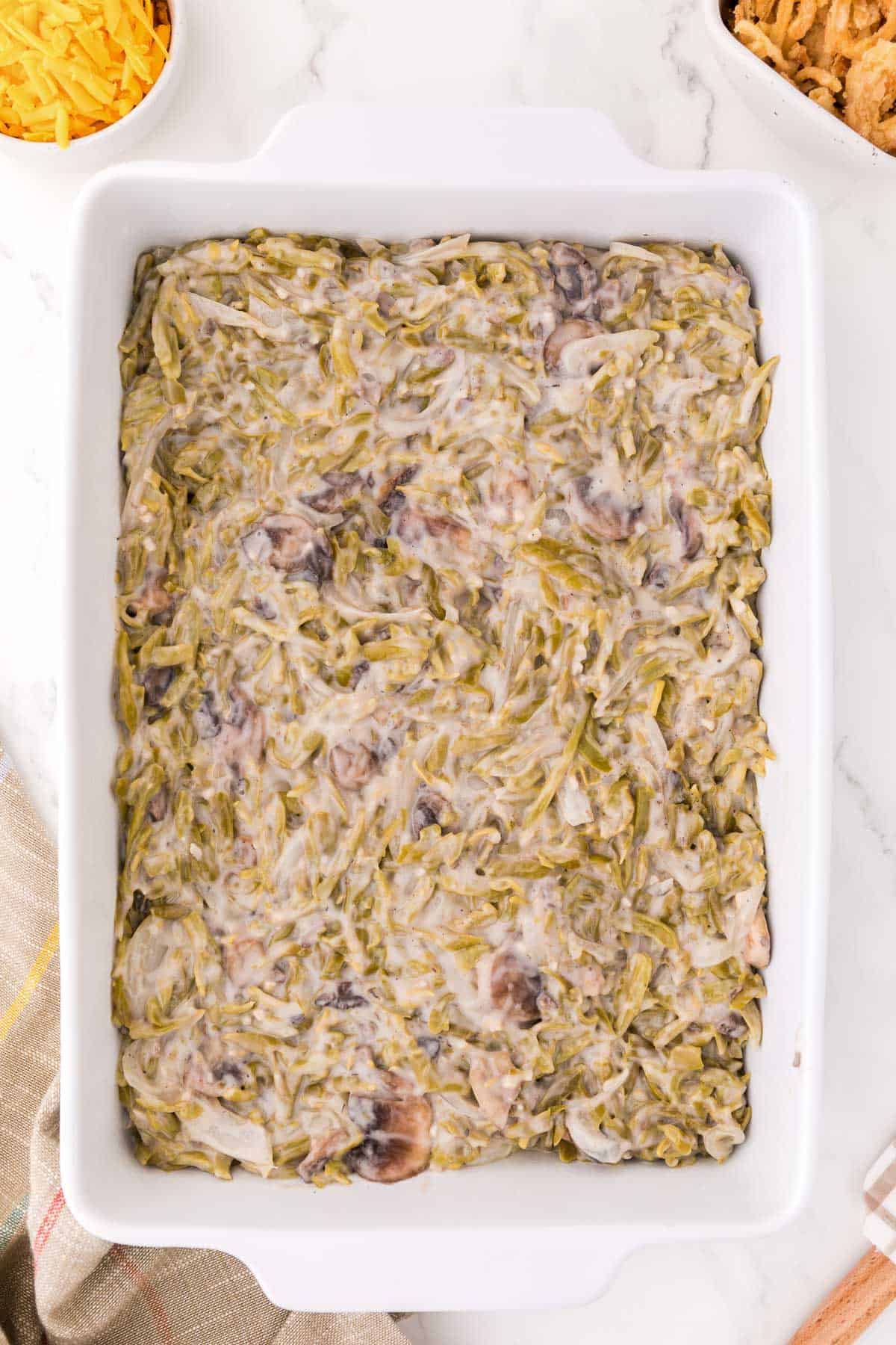 green bean mushroom mixture in the casserole dish