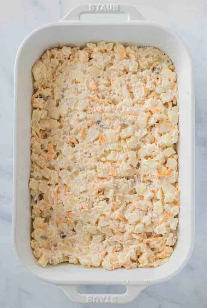 the casserole filling mixed together and spread out in the baking dish