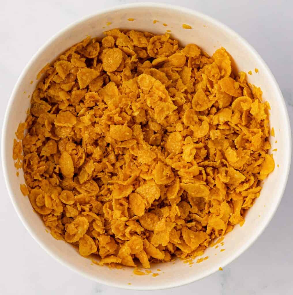 buttery corn flake topping in a mixing bowl