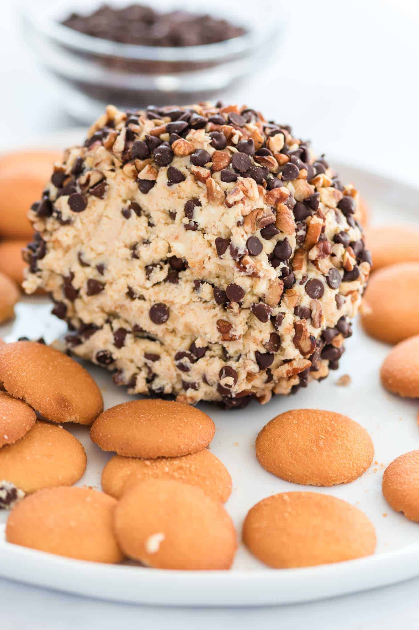 chocolate chip dessert cheese ball showing the inside with nilla wafers around it