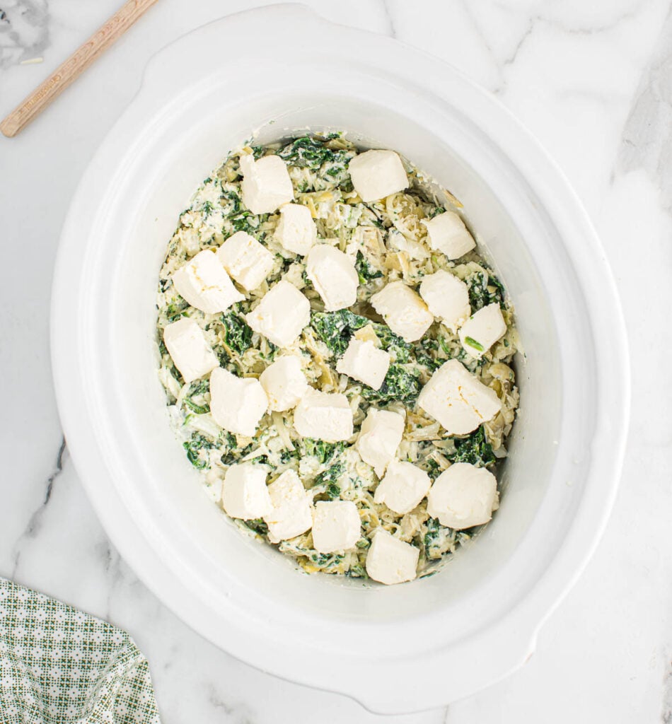 cream cheese chunks added to the top of the dip