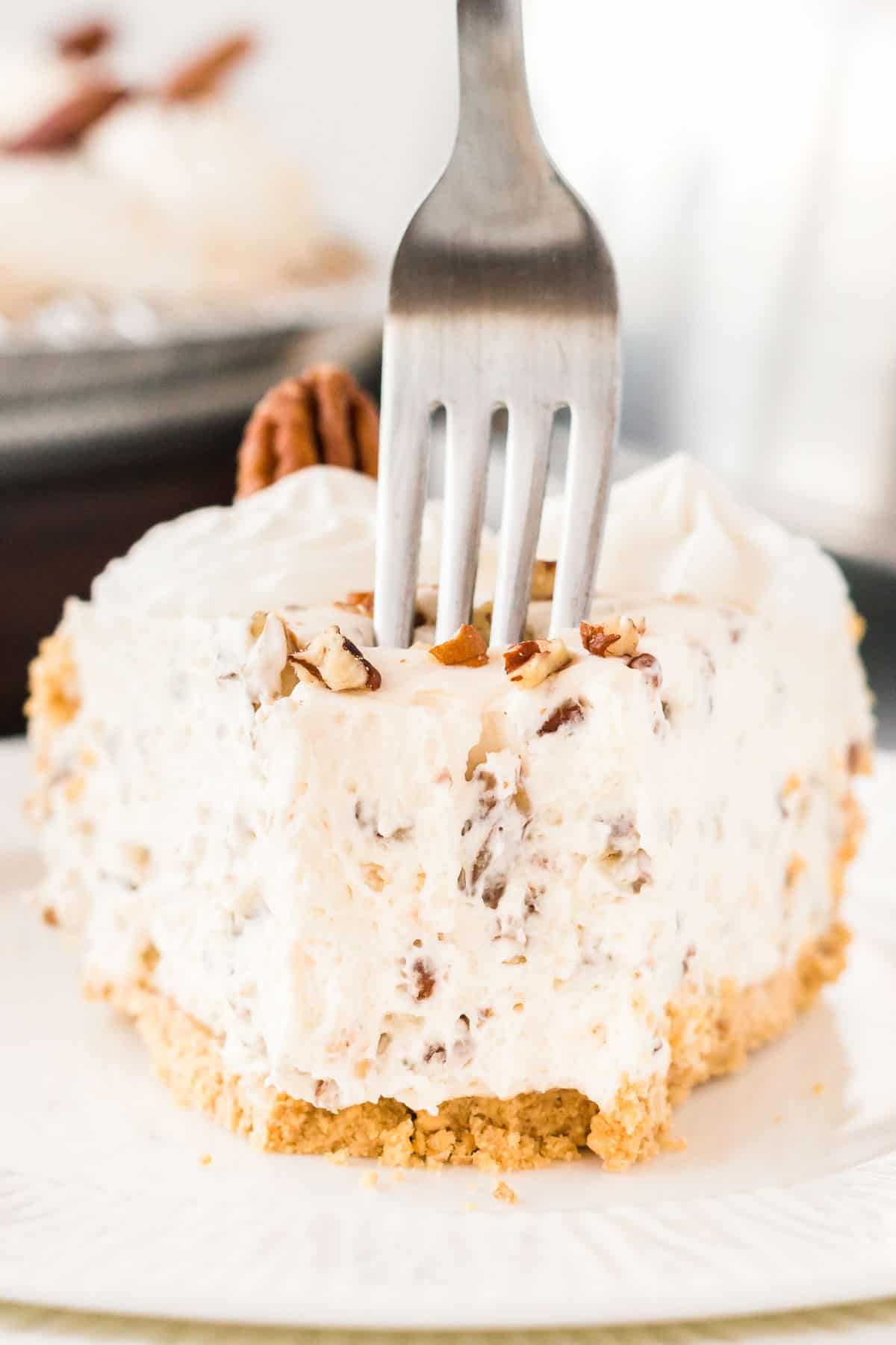 taking a bite of pecan pie