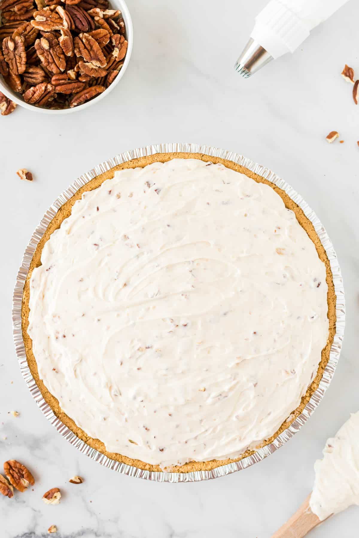 spreading the filling into the graham pie crust