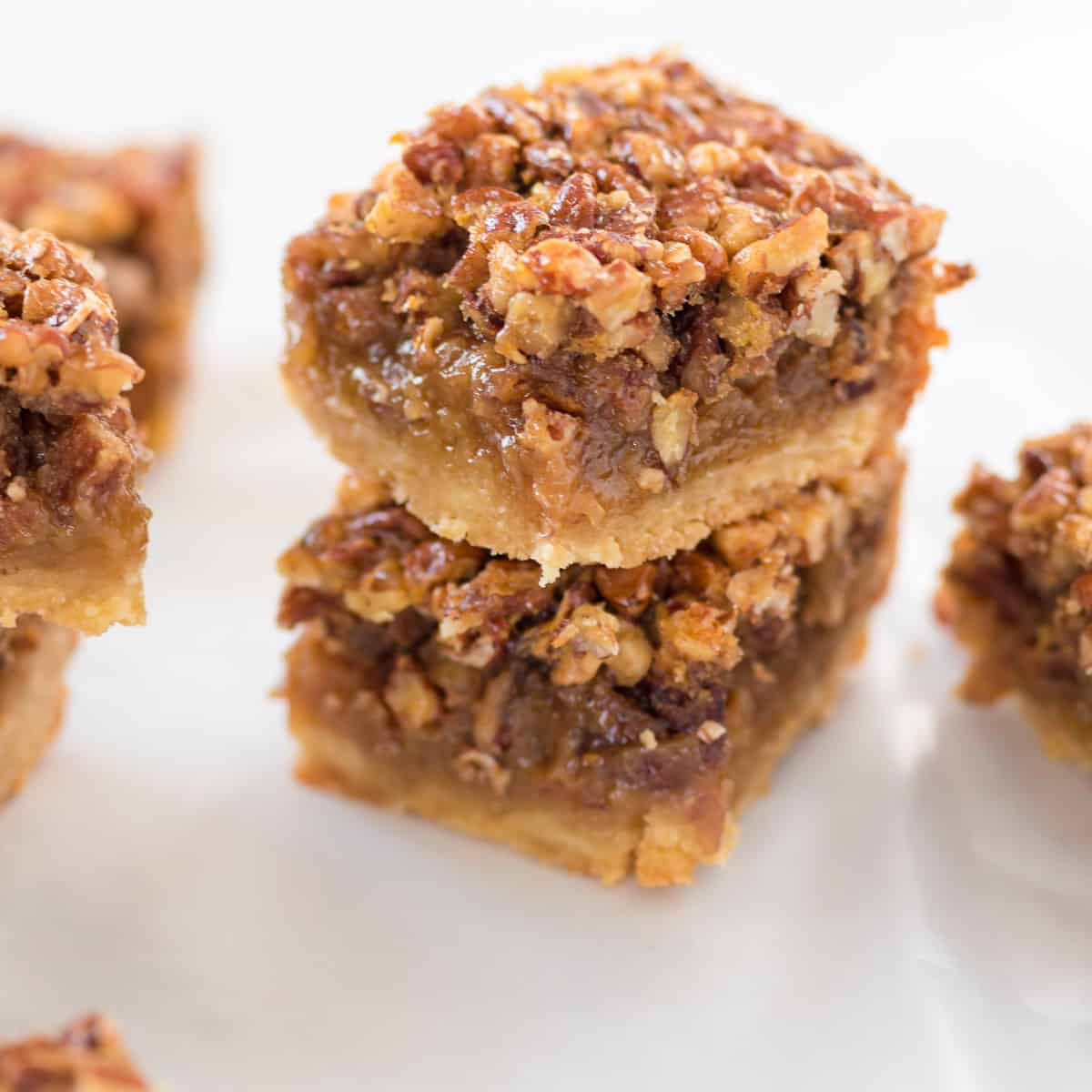 pecan pie bars stacked on top of each other