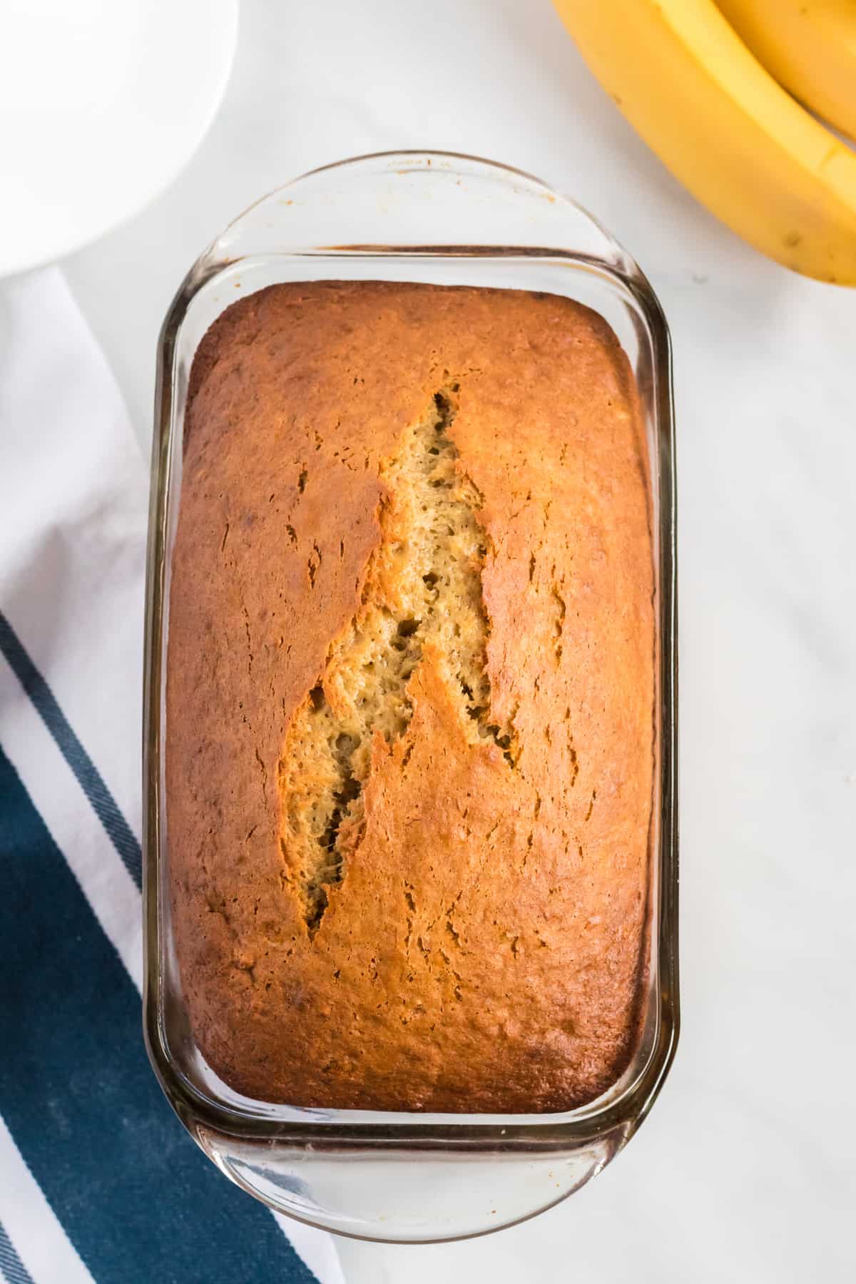 banana bread in a glass loaf pan