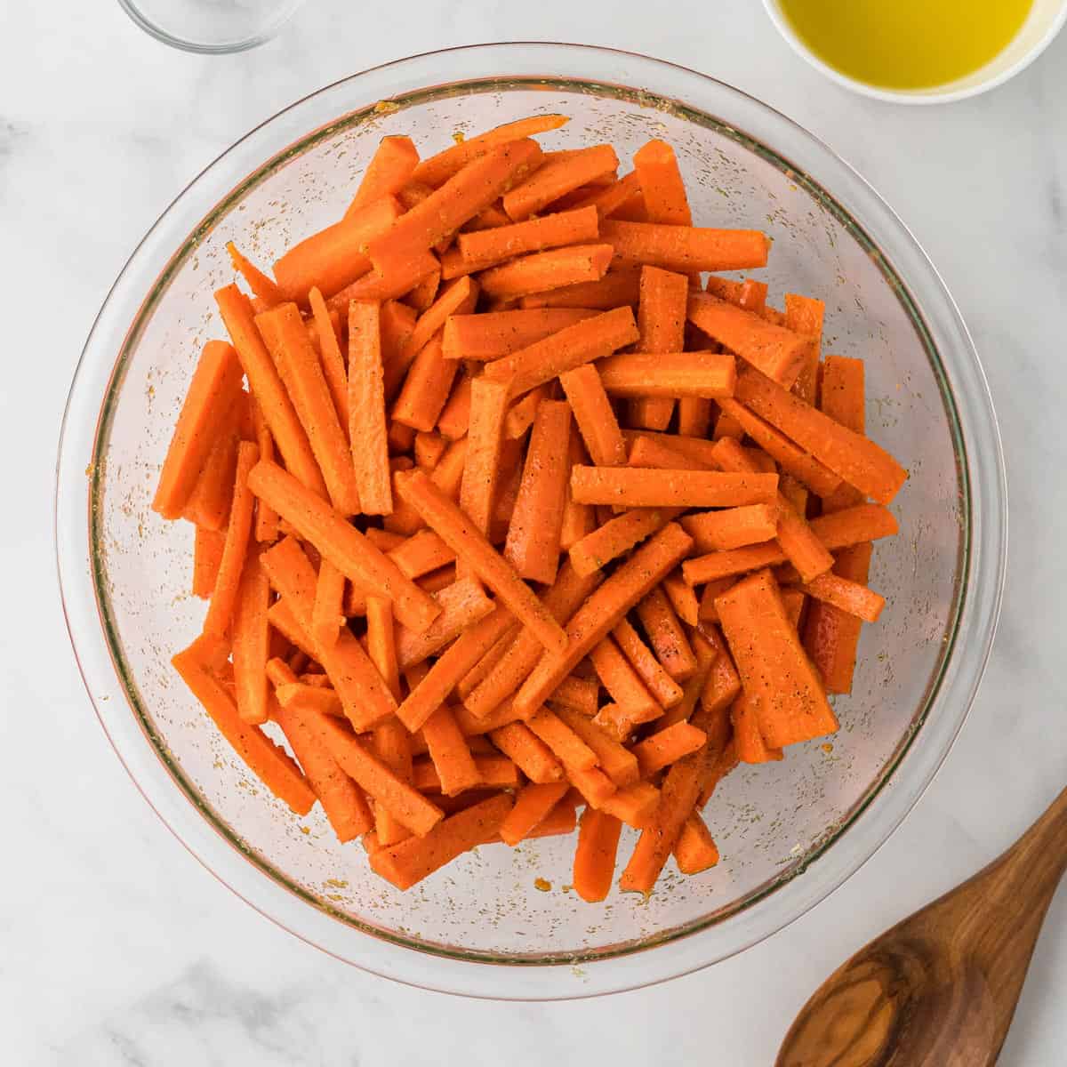 carrots mixed with spices and olive oil