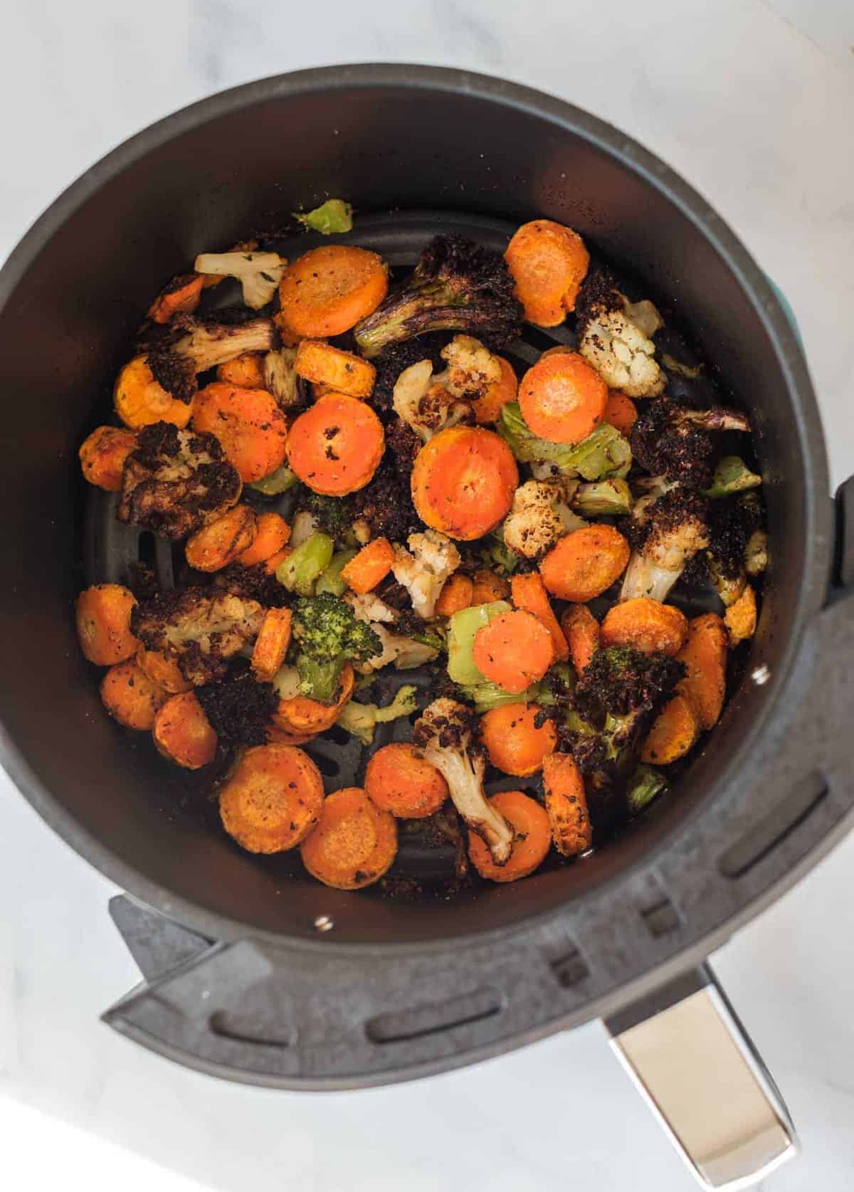 air fried crispy frozen vegetables in the air fryer basket