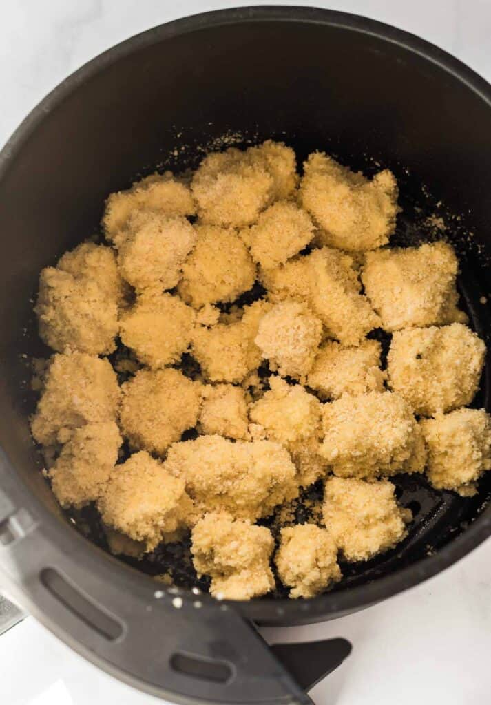 breaded tofu nuggets in the air fryer basket