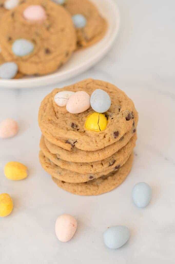 5 cadbury mini egg cookies stacked on top of each other