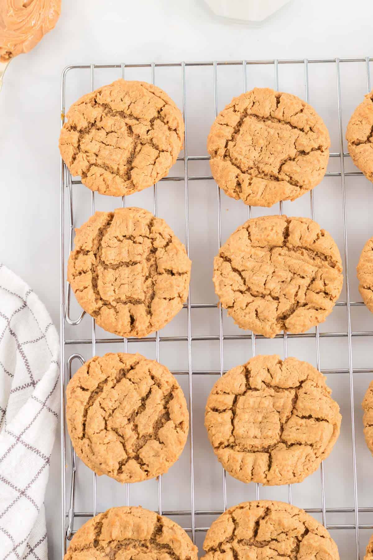 gluten free peanut butter cookies on a wire cooling rack