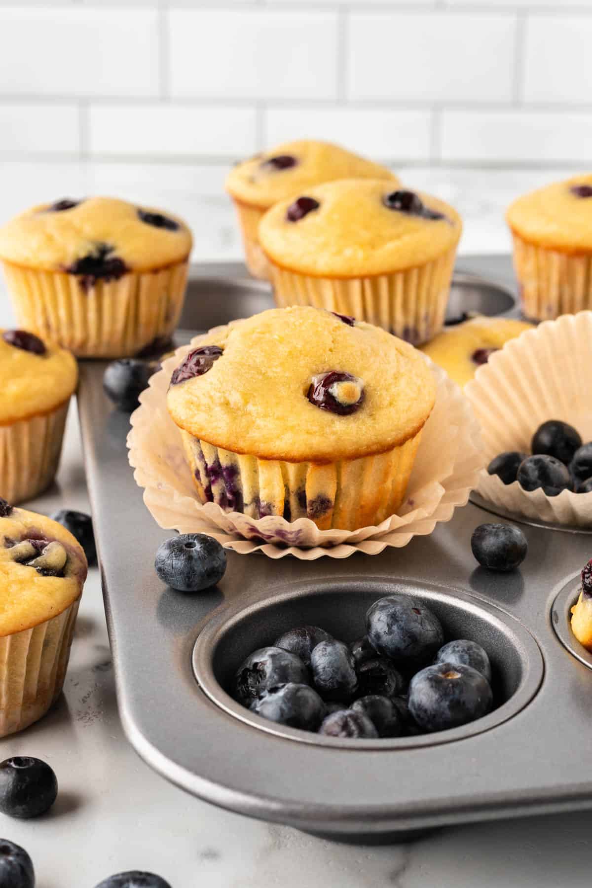 greek yogurt blueberry muffins in the pan