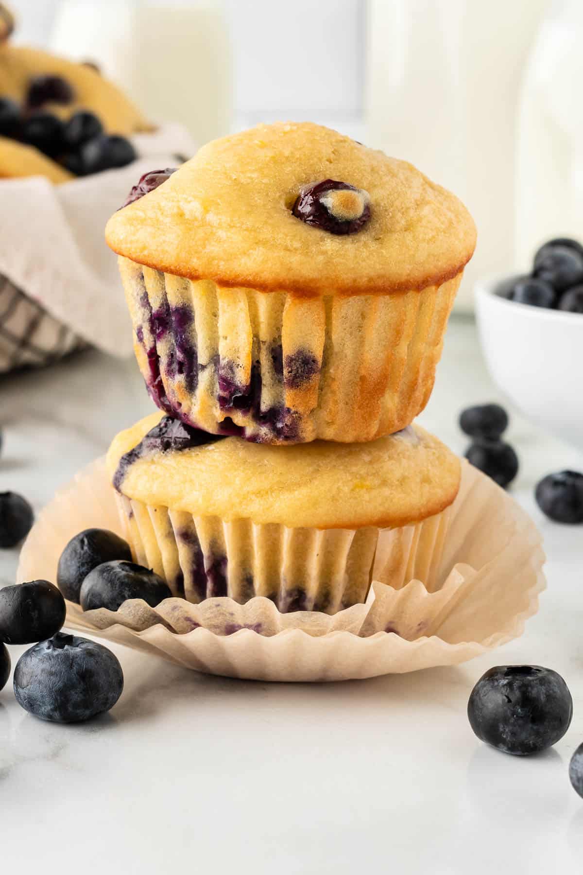 two yogurt blueberry muffins stacked