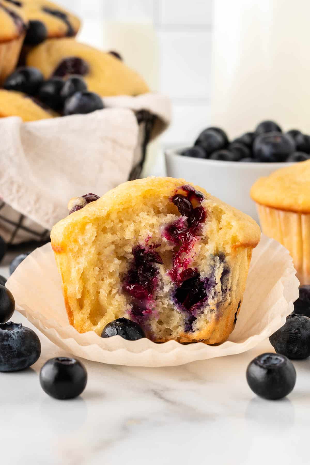 greek yogurt muffin with a bite taken out to show the inside