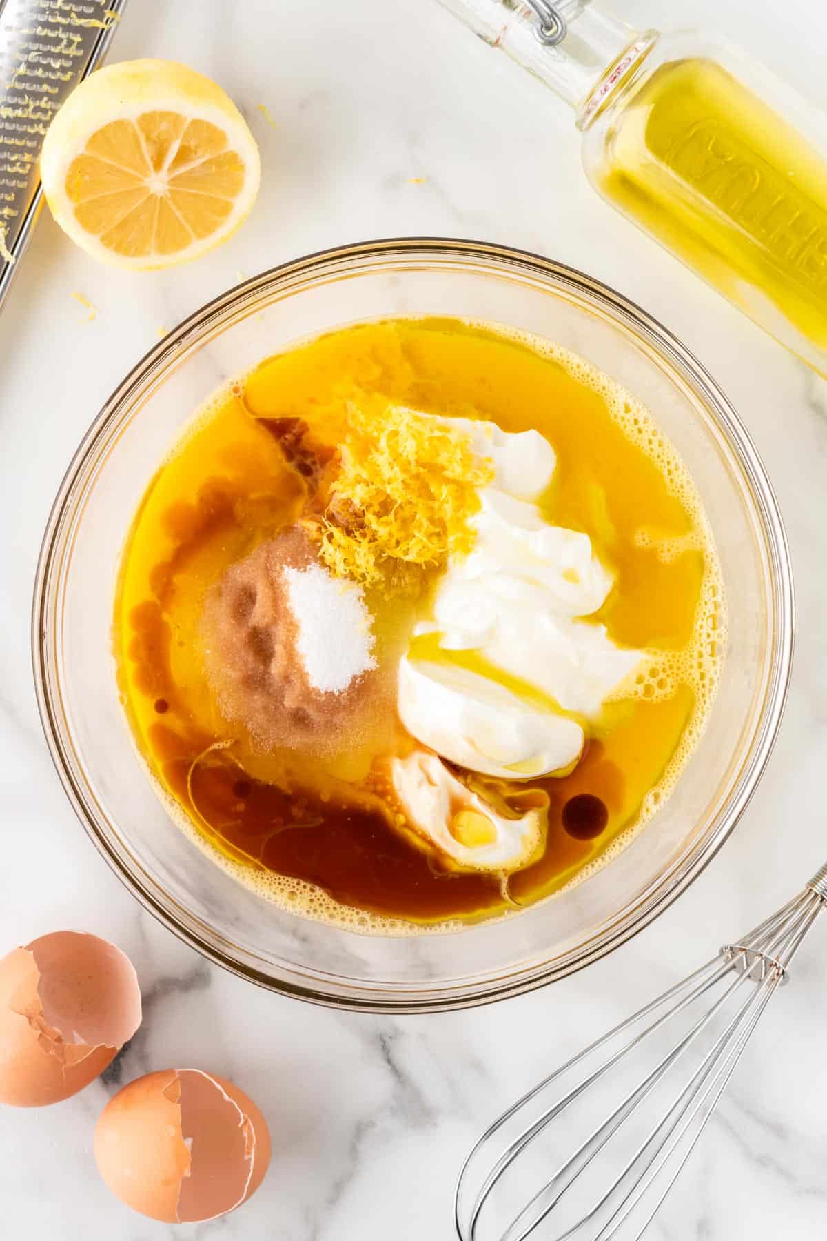 adding the wet ingredients to a mixing bowl