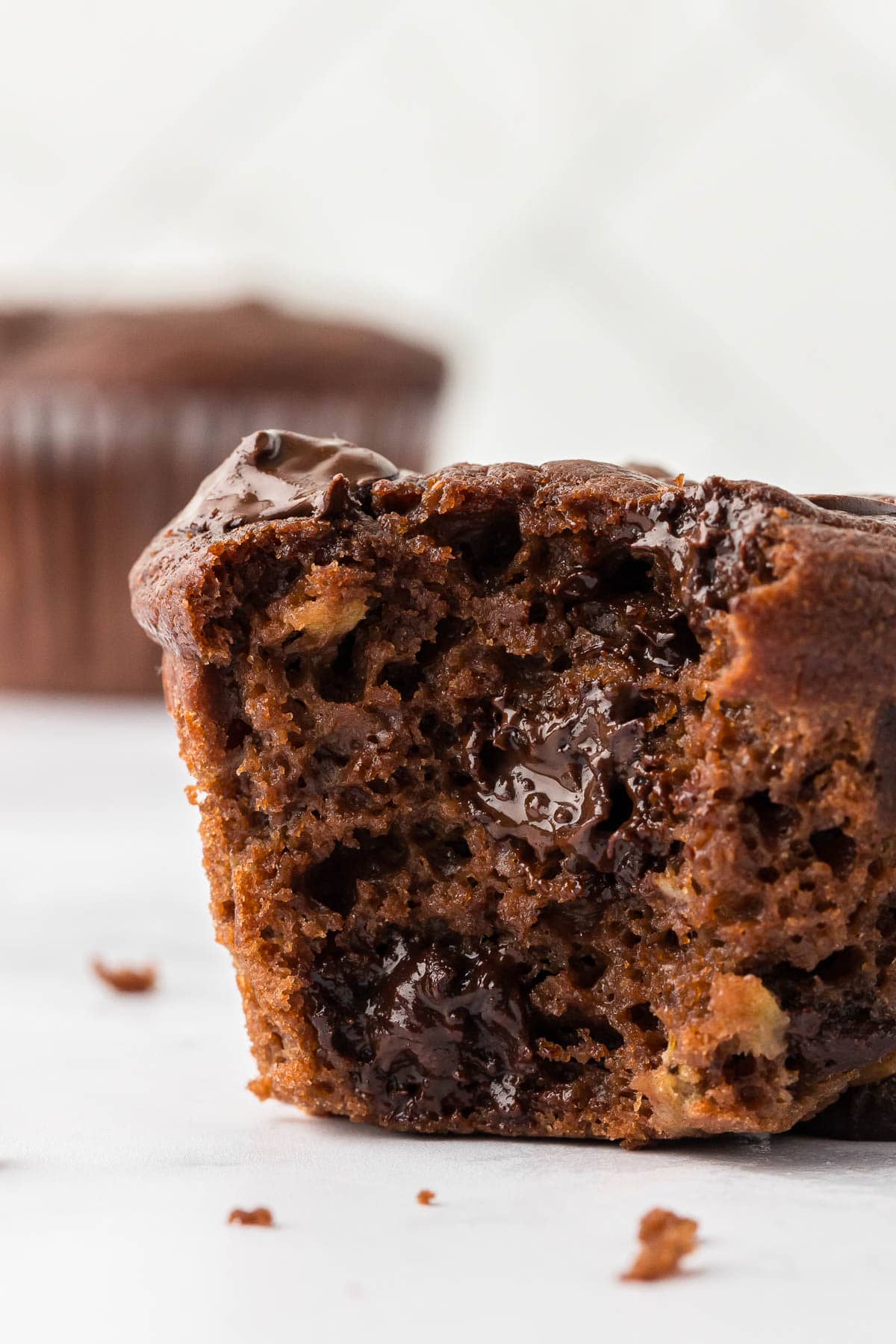 healthy chocolate muffin with a bite taken out