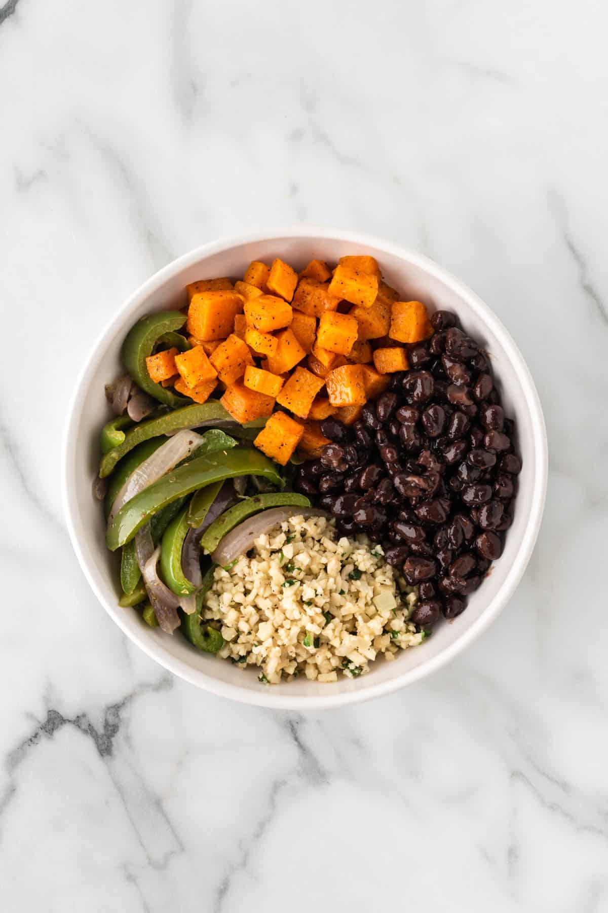 adding the sweet potatoes and black beans