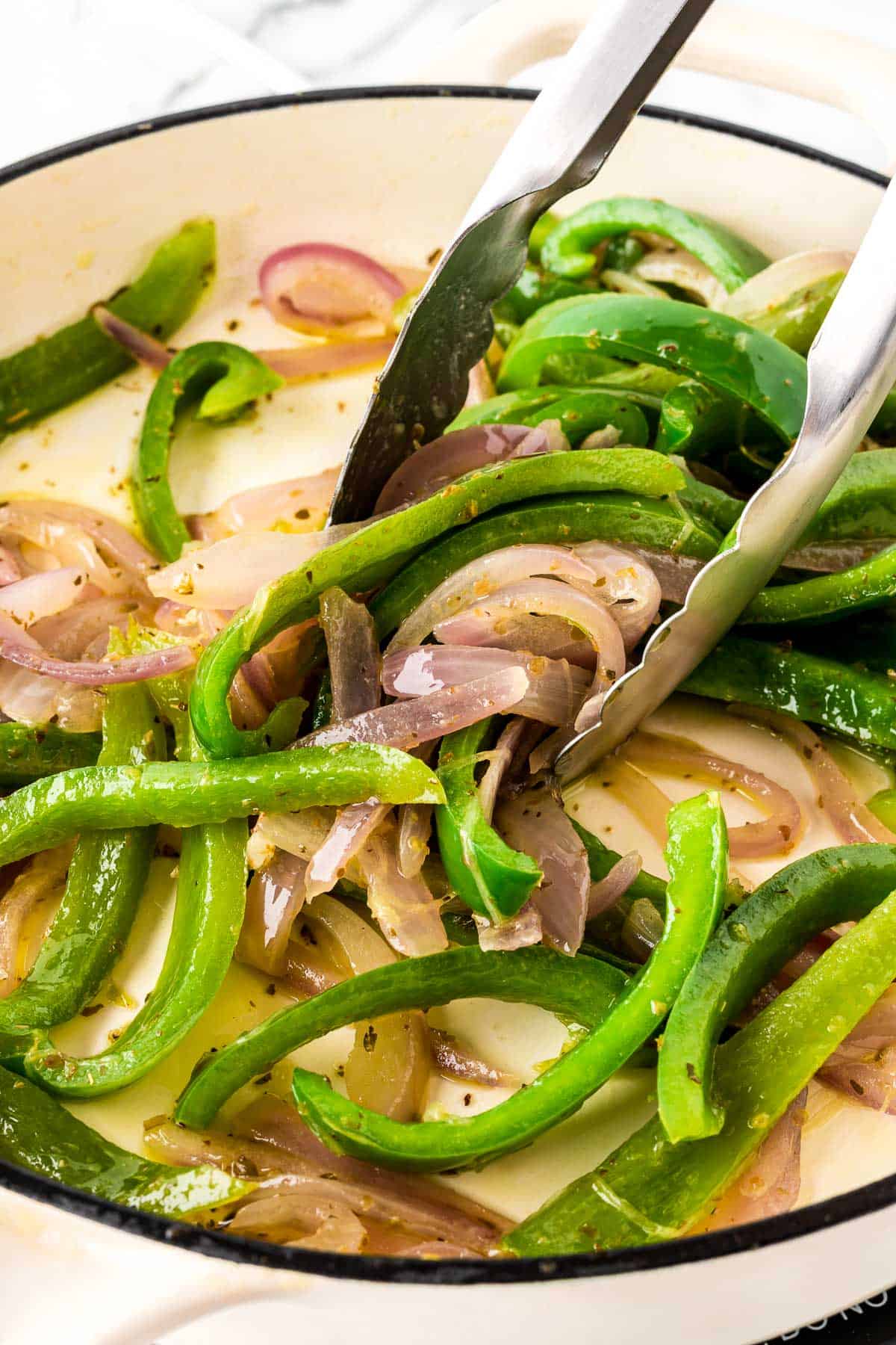 taking a scoop of fajita veggies