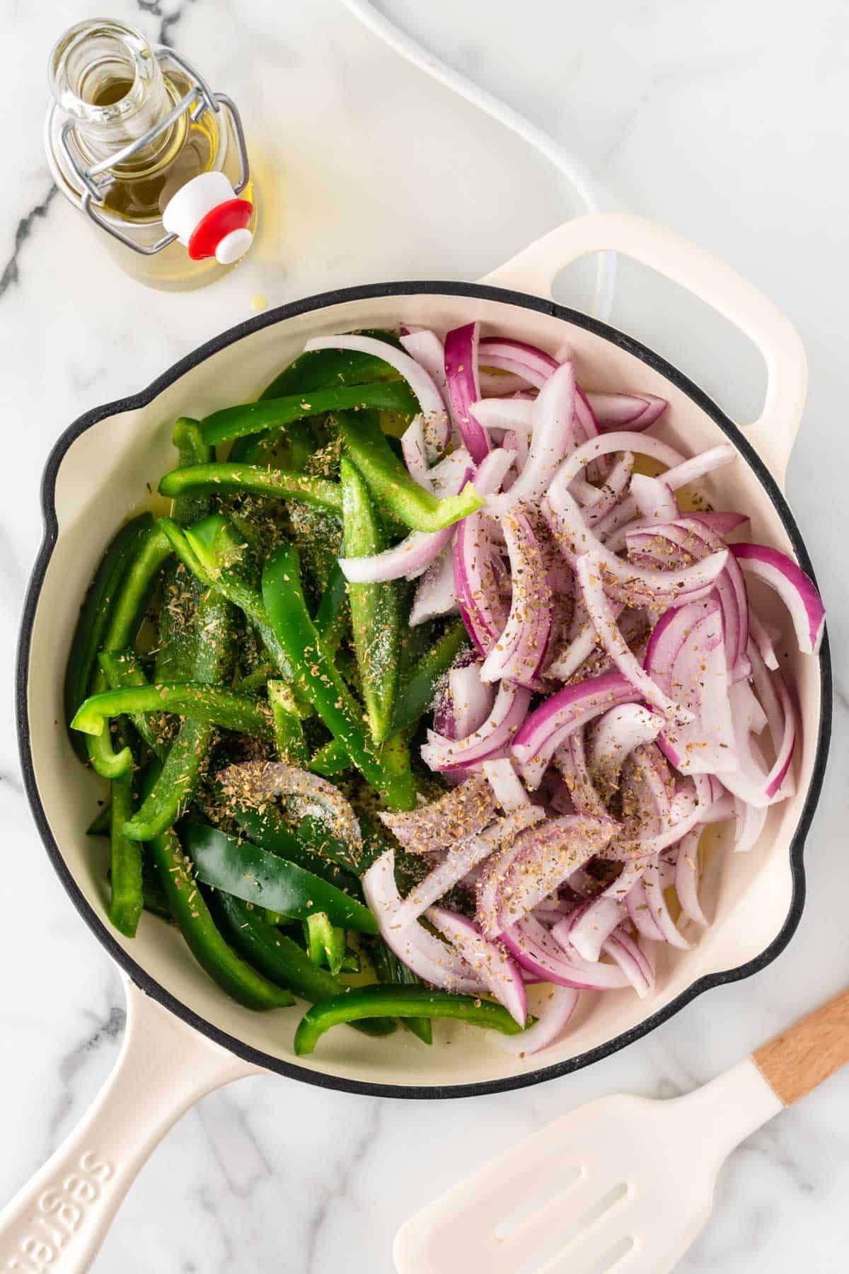 adding the veggies to a skillet