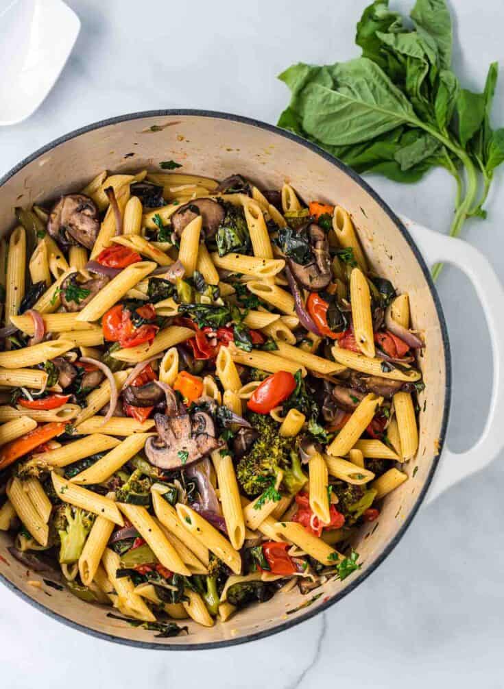 roasted vegetable pasta in a white dutch oven