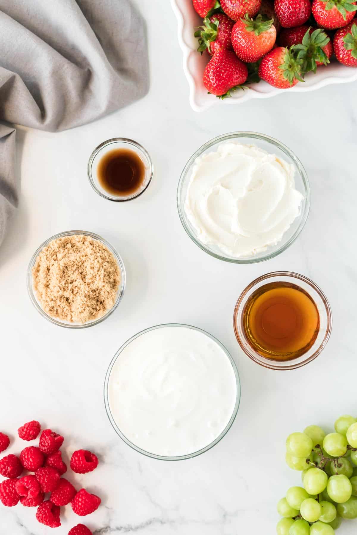 cream cheese fruit dip ingredients in glass bowls