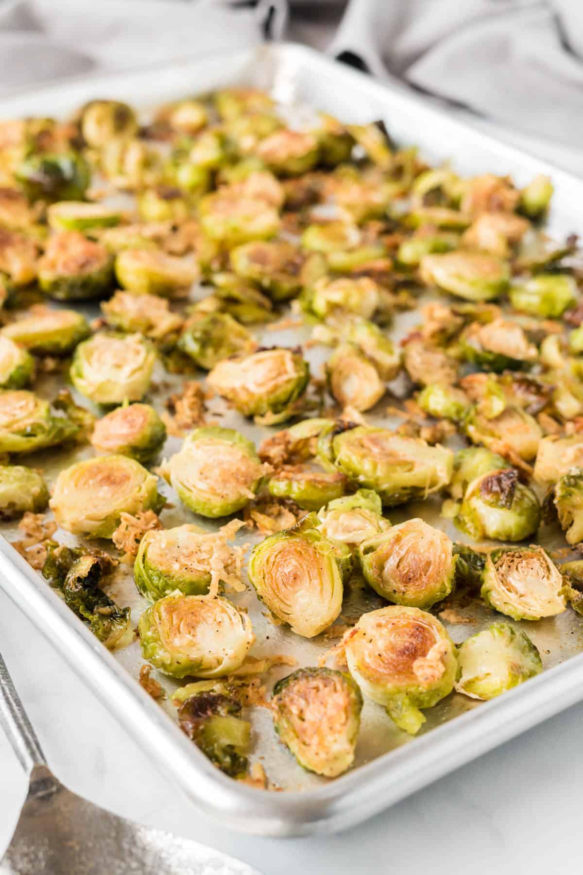 roasted brussels sprouts on a baking sheet