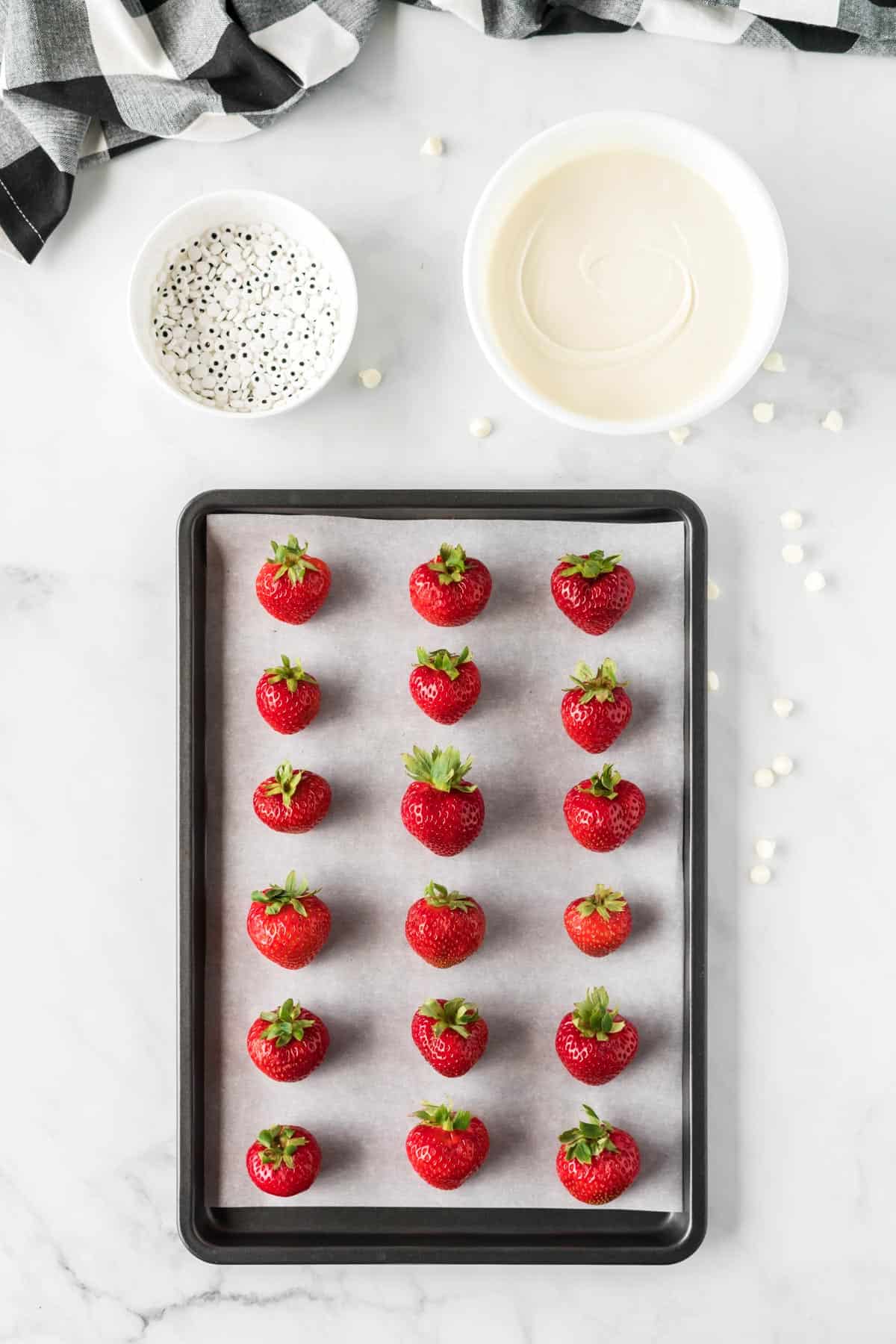strawberries on a baking sheet