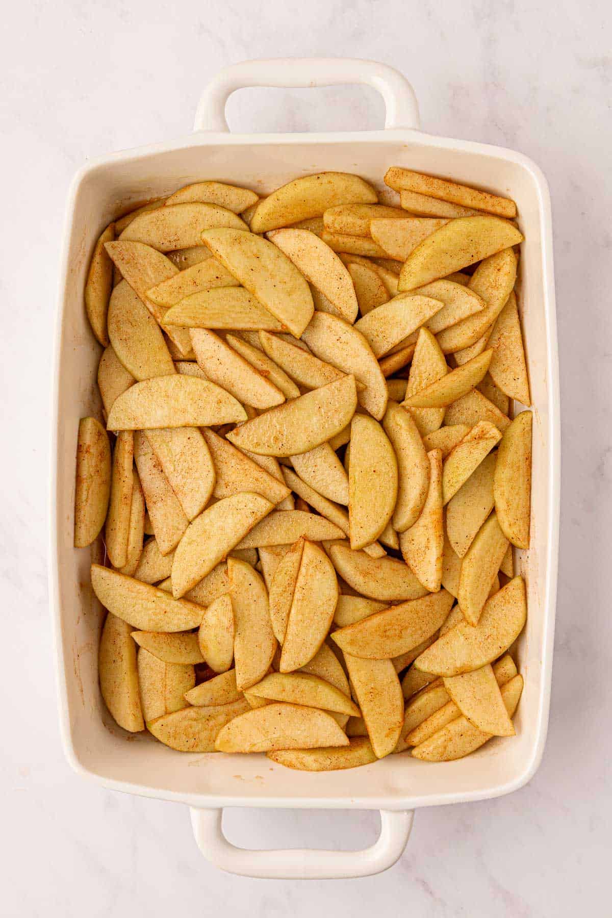spiced apple slices in a baking dish