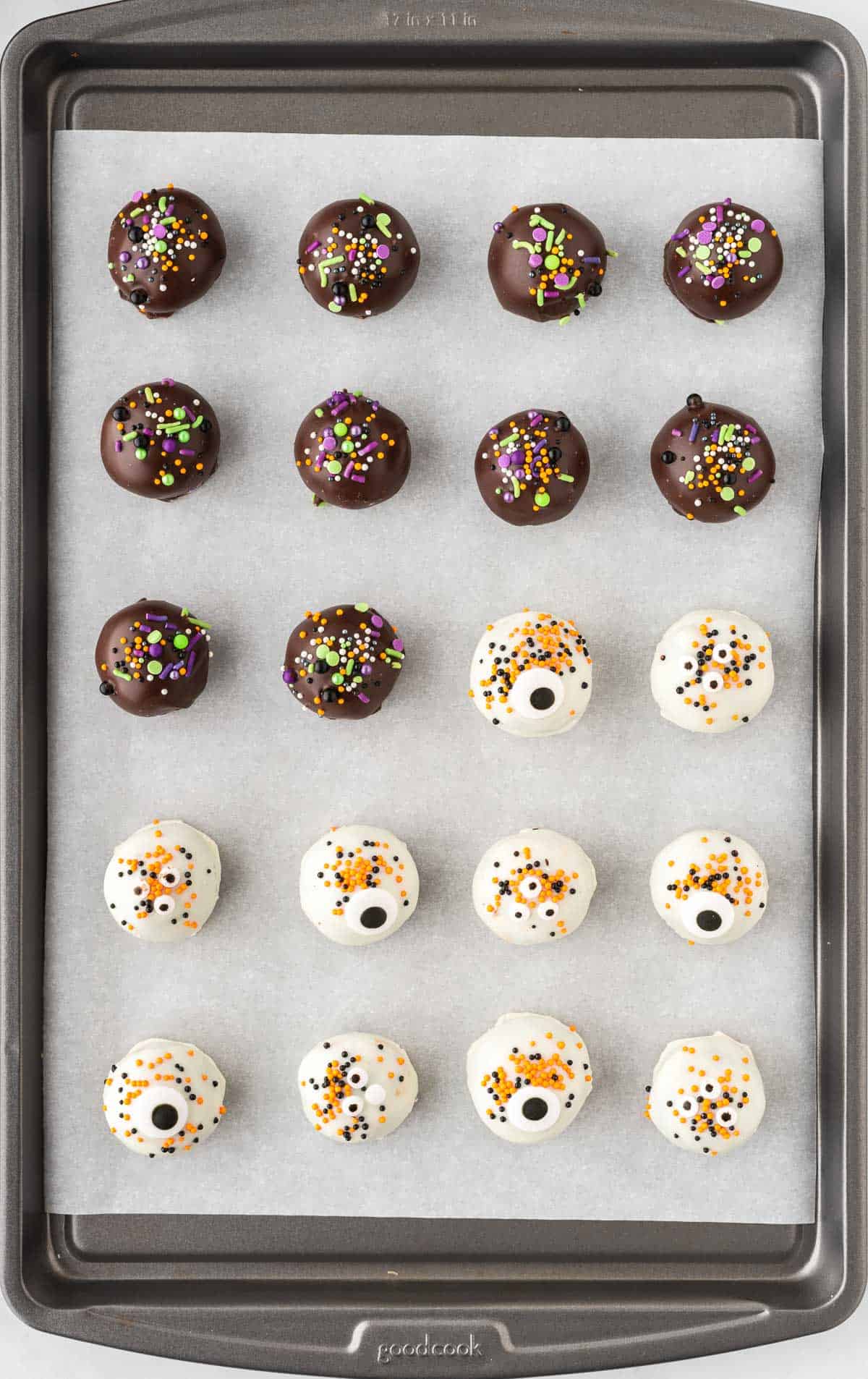 halloween oreo balls on a baking sheet
