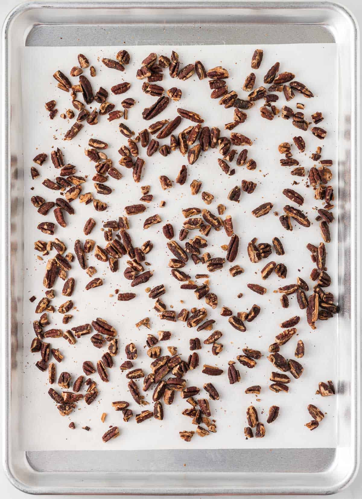 pecans on a baking sheet