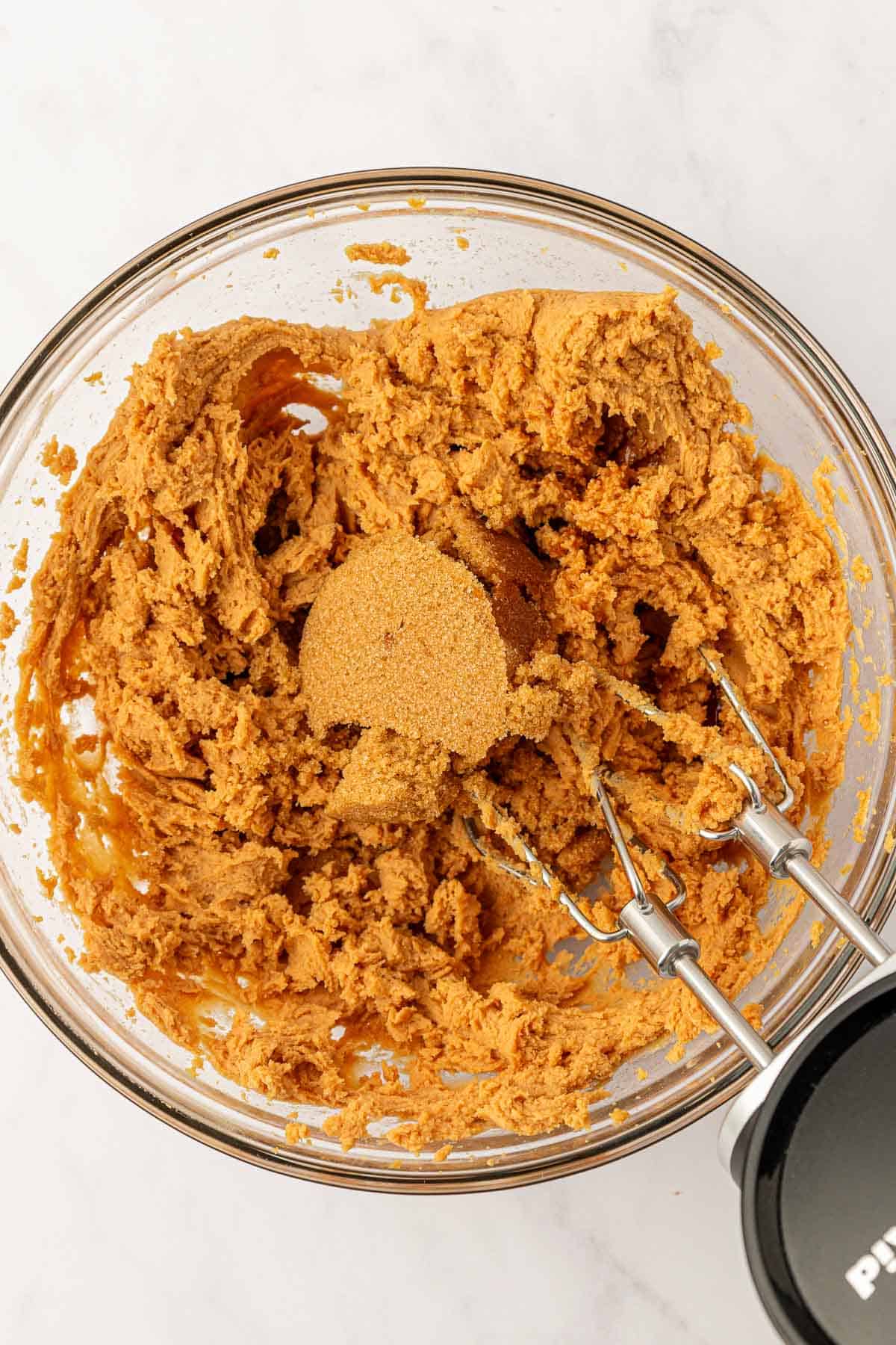 adding the brown sugar to the peanut butter mixture