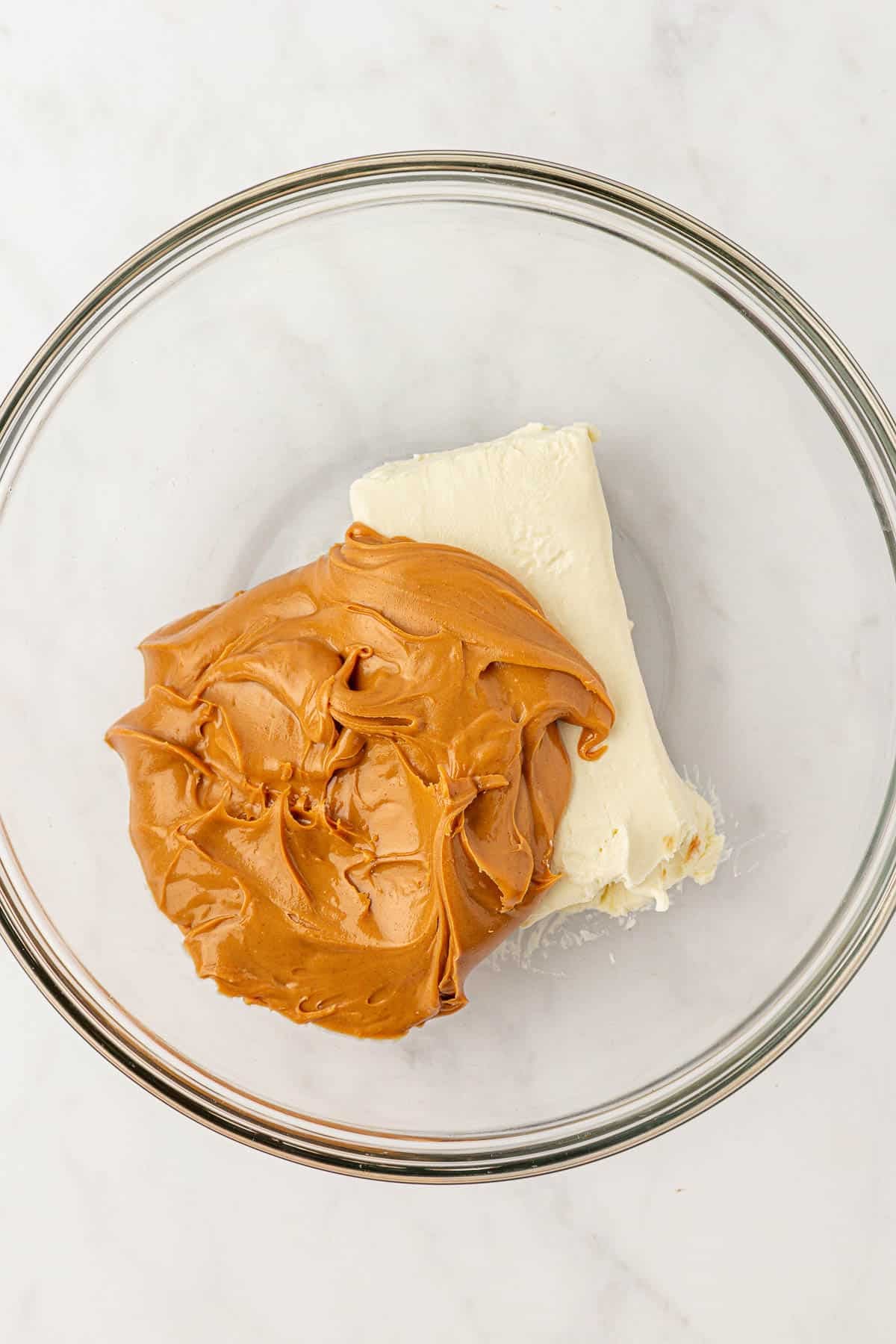 cream cheese and peanut butter in a mixing bowl
