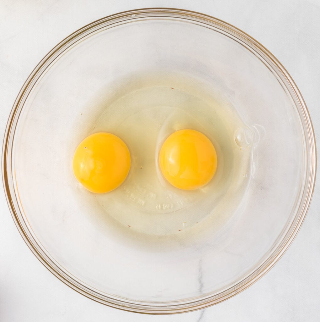 two eggs in a mixing bowl