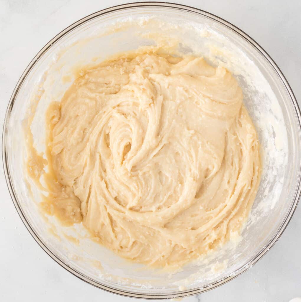 cake mix cookie bar batter in a mixing bowl