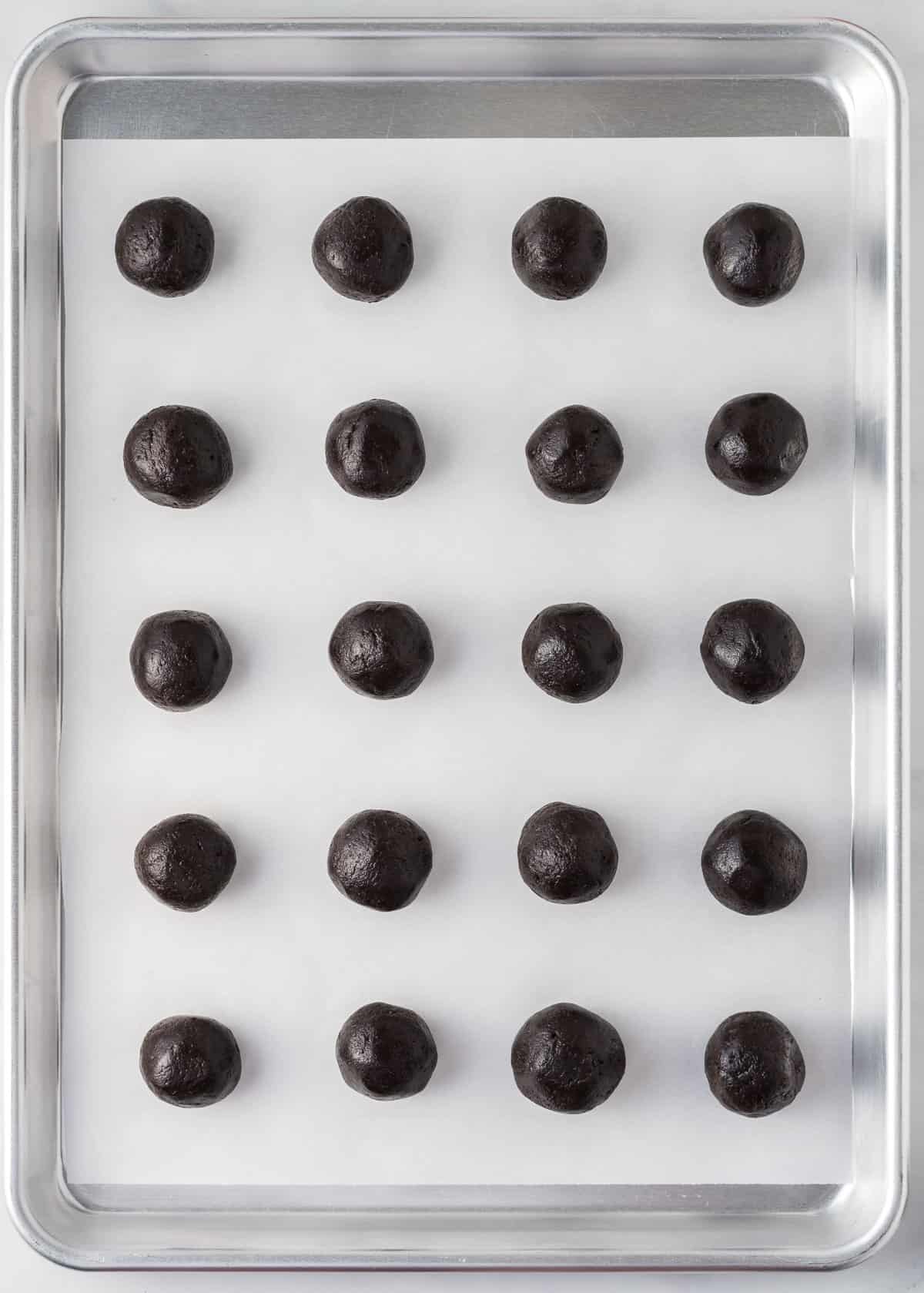 oreo balls on a baking sheet