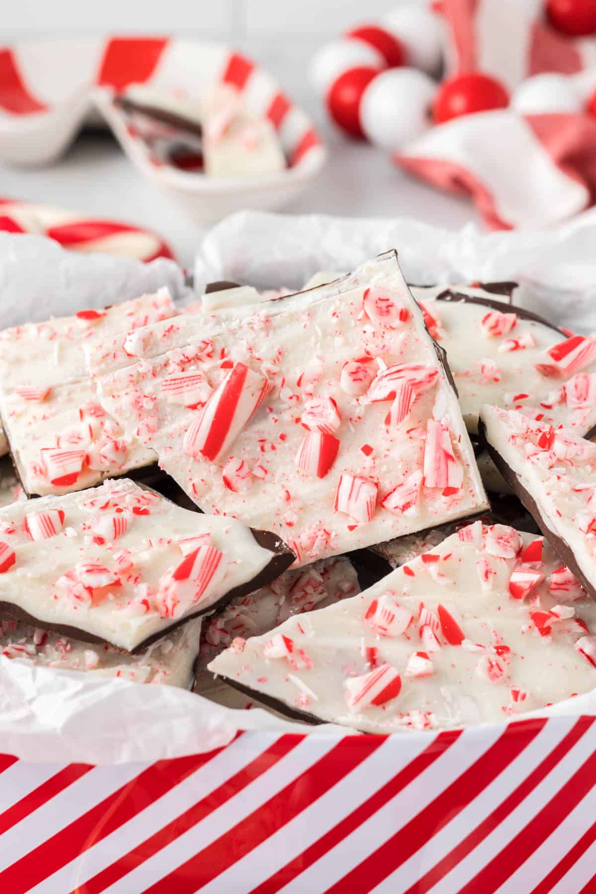 chocolate peppermint bark in a candy tin