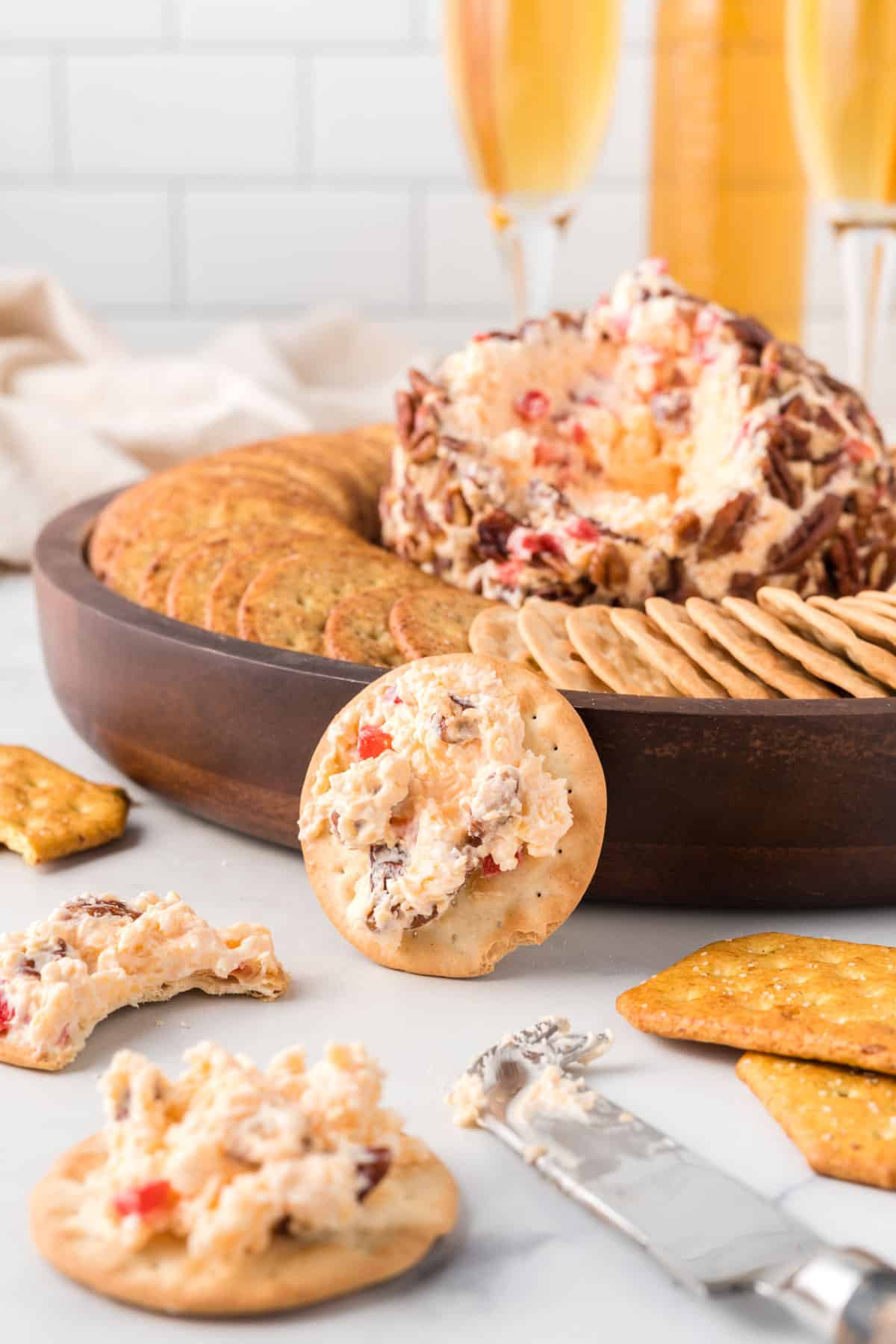 cracker with pimento cheese ball on it