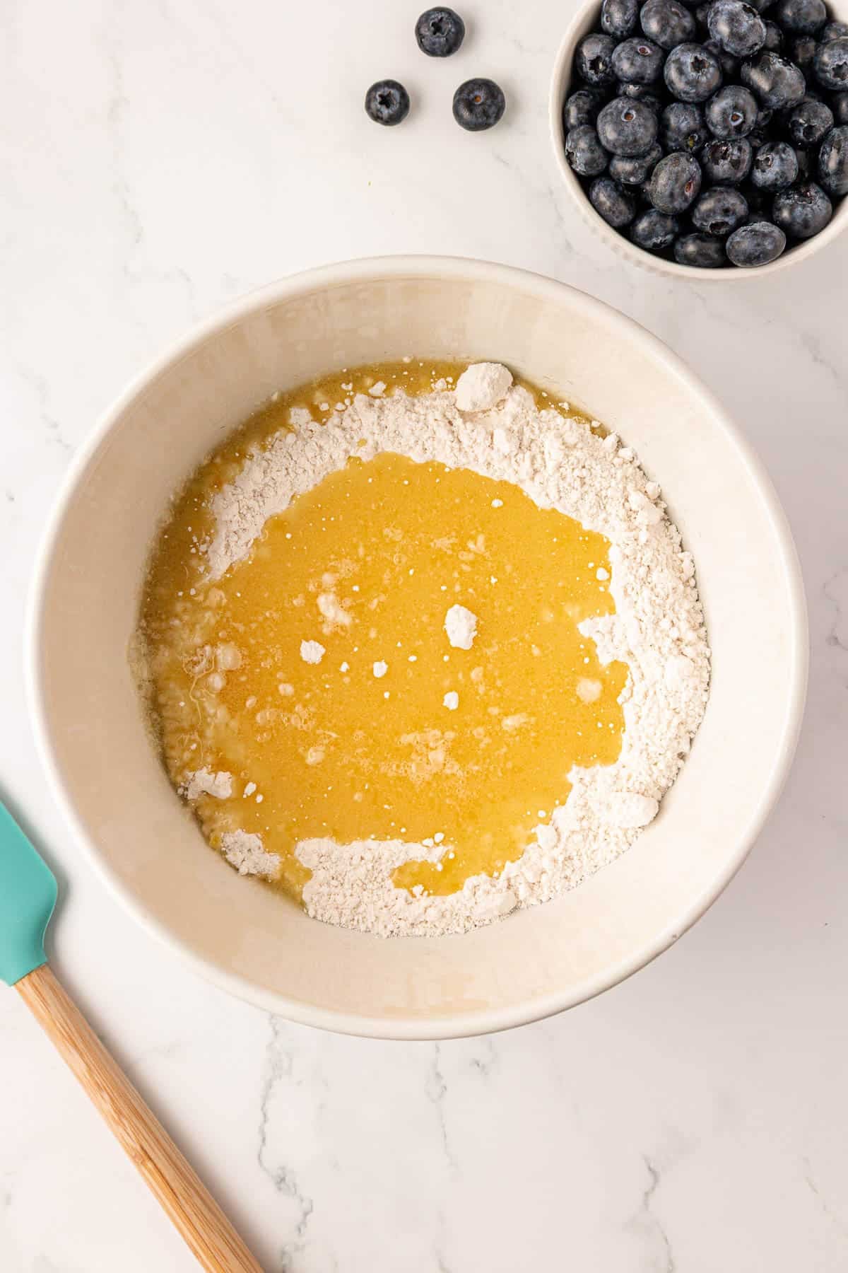 cake mix and wet ingredients in a mixing bowl