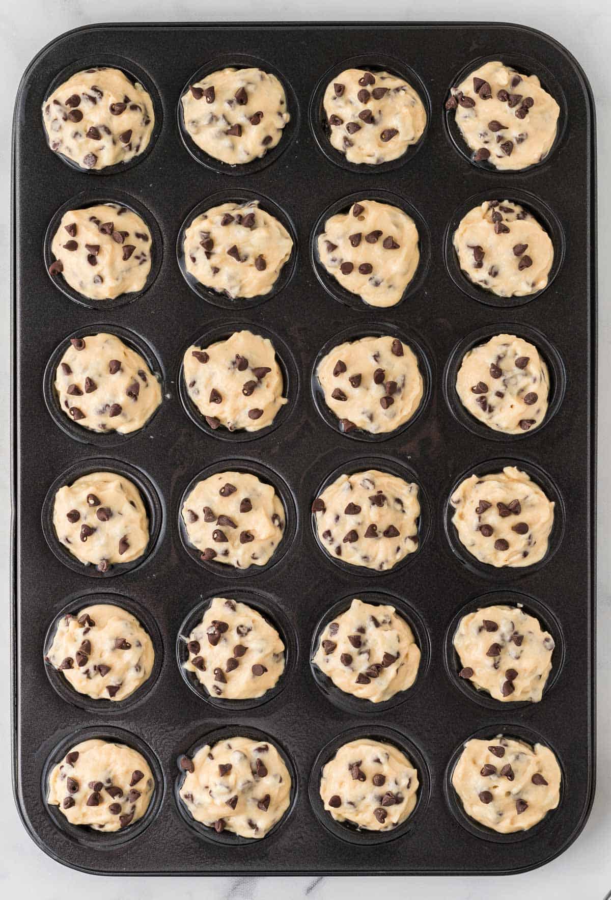 mini muffin pan filled with batter