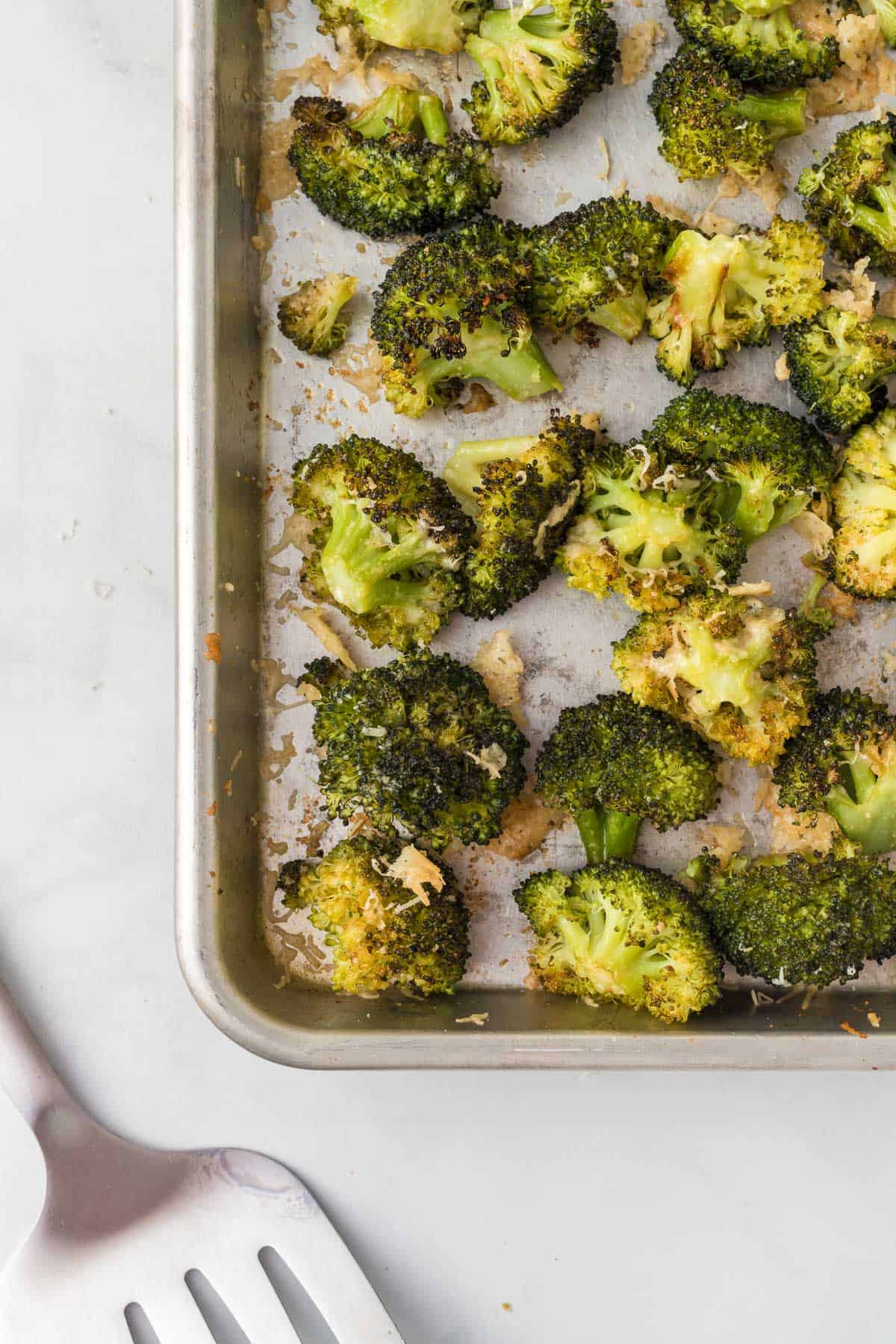 roasted broccoli on a baking sheet