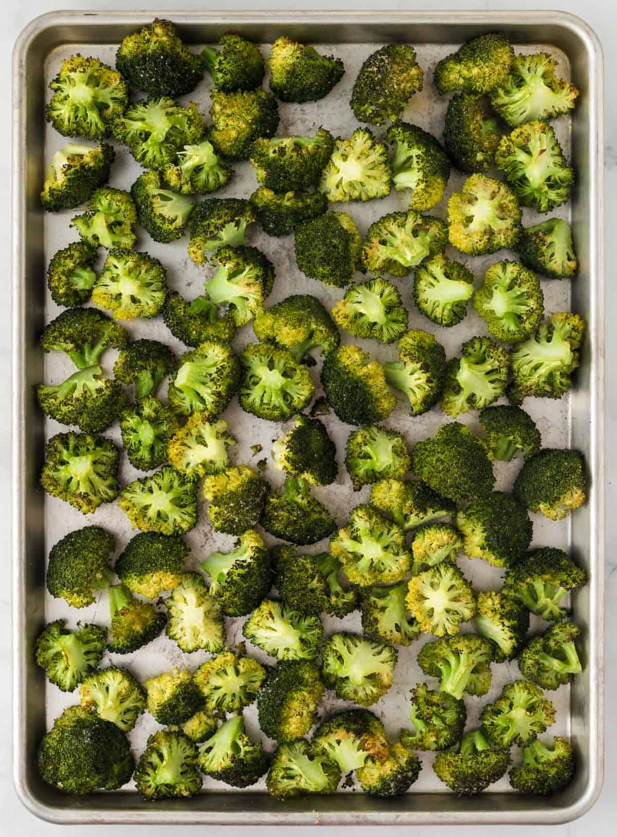 roasted broccoli on a baking sheet