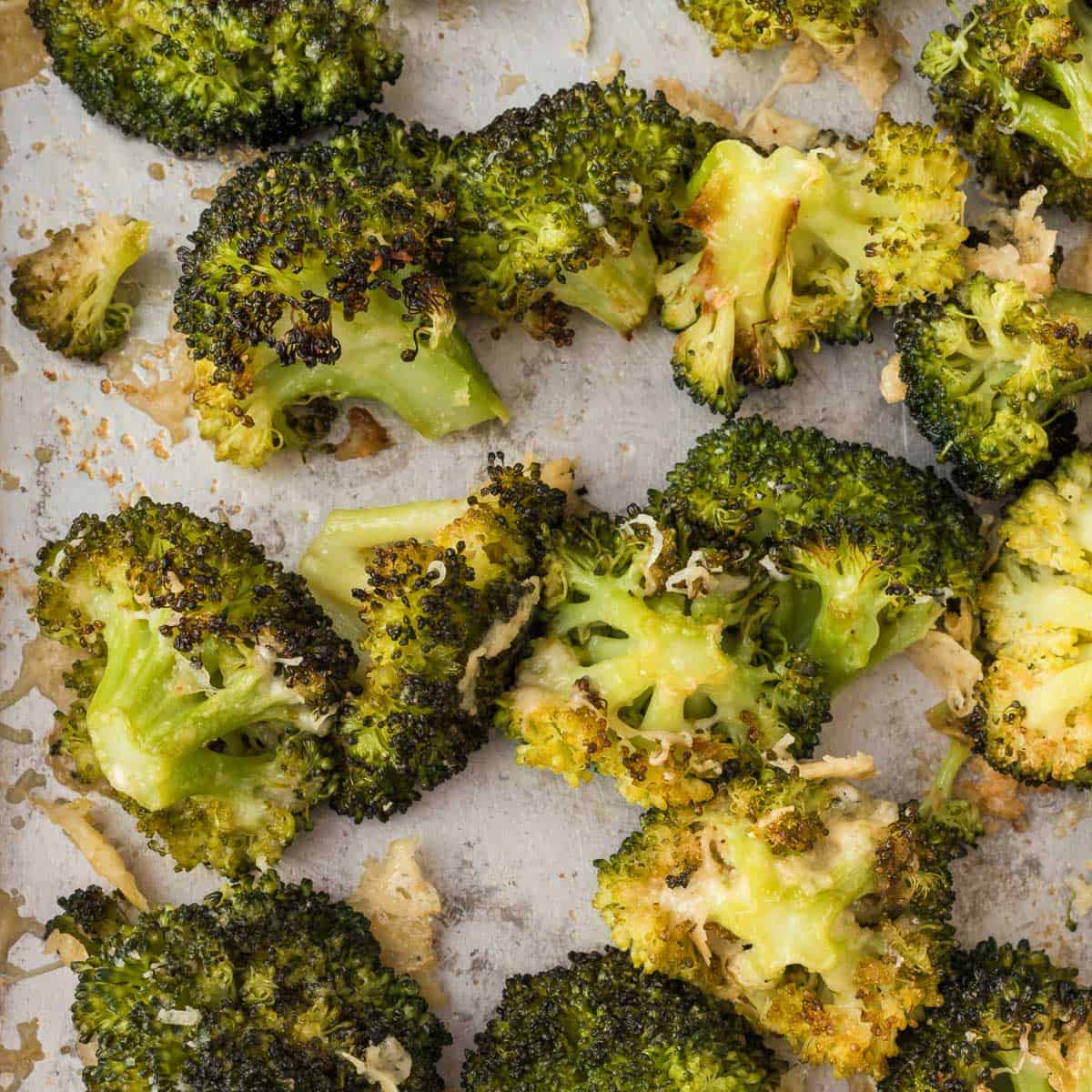 roasted broccoli with parmesan on a sheet pan