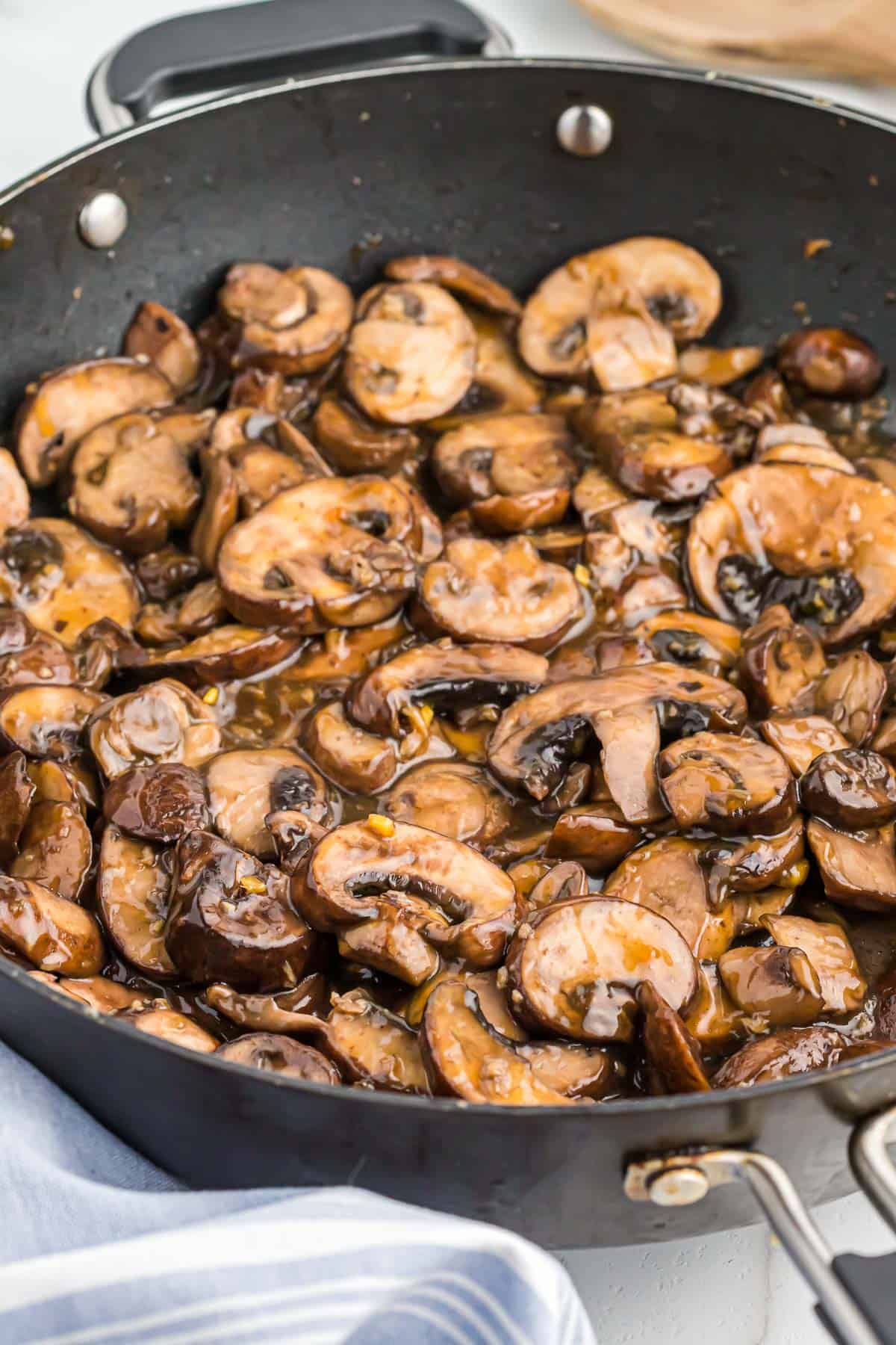 teriyaki fried mushrooms in a skillet